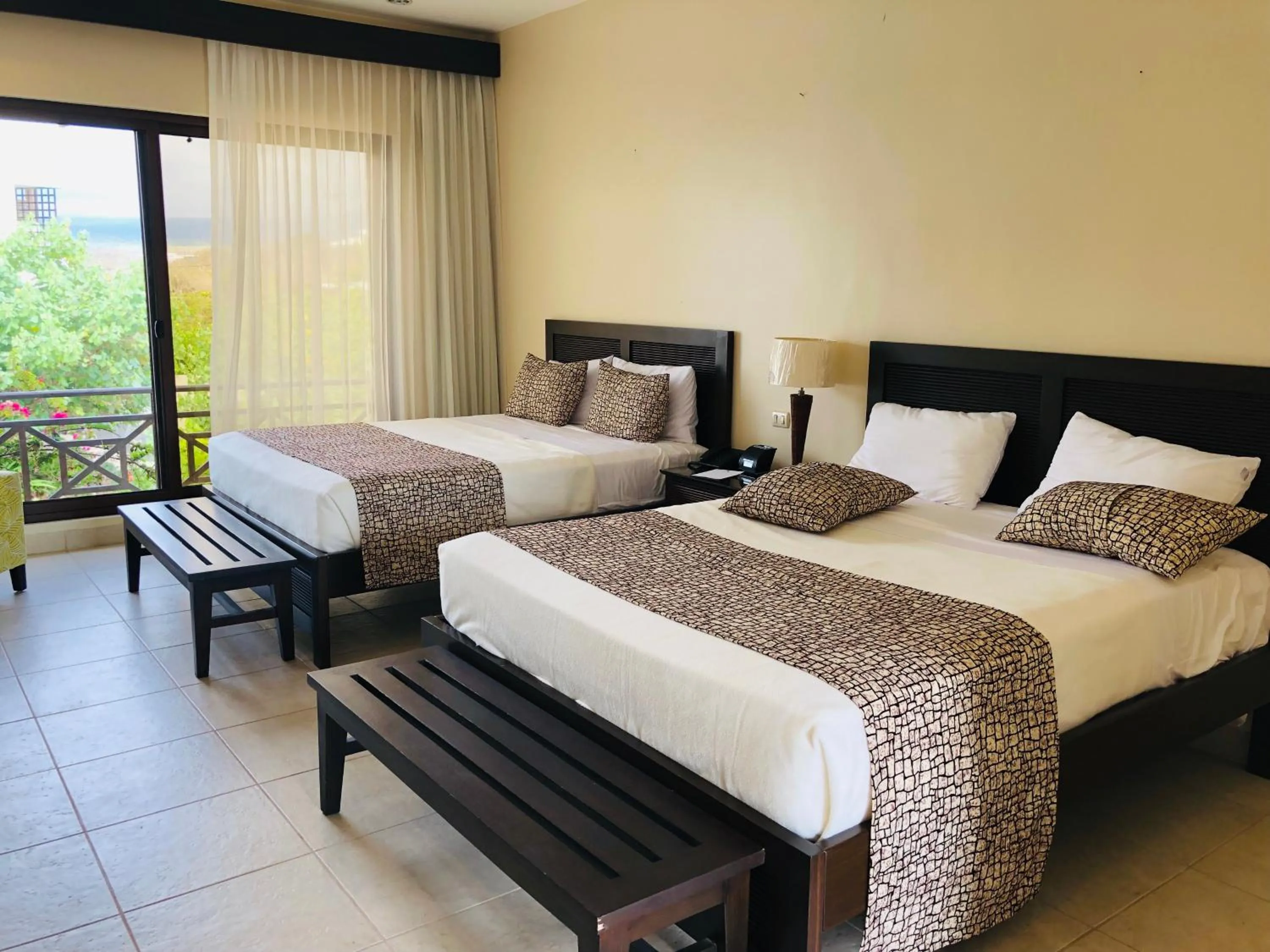 Bed in Palo Santo Galápagos Hotel