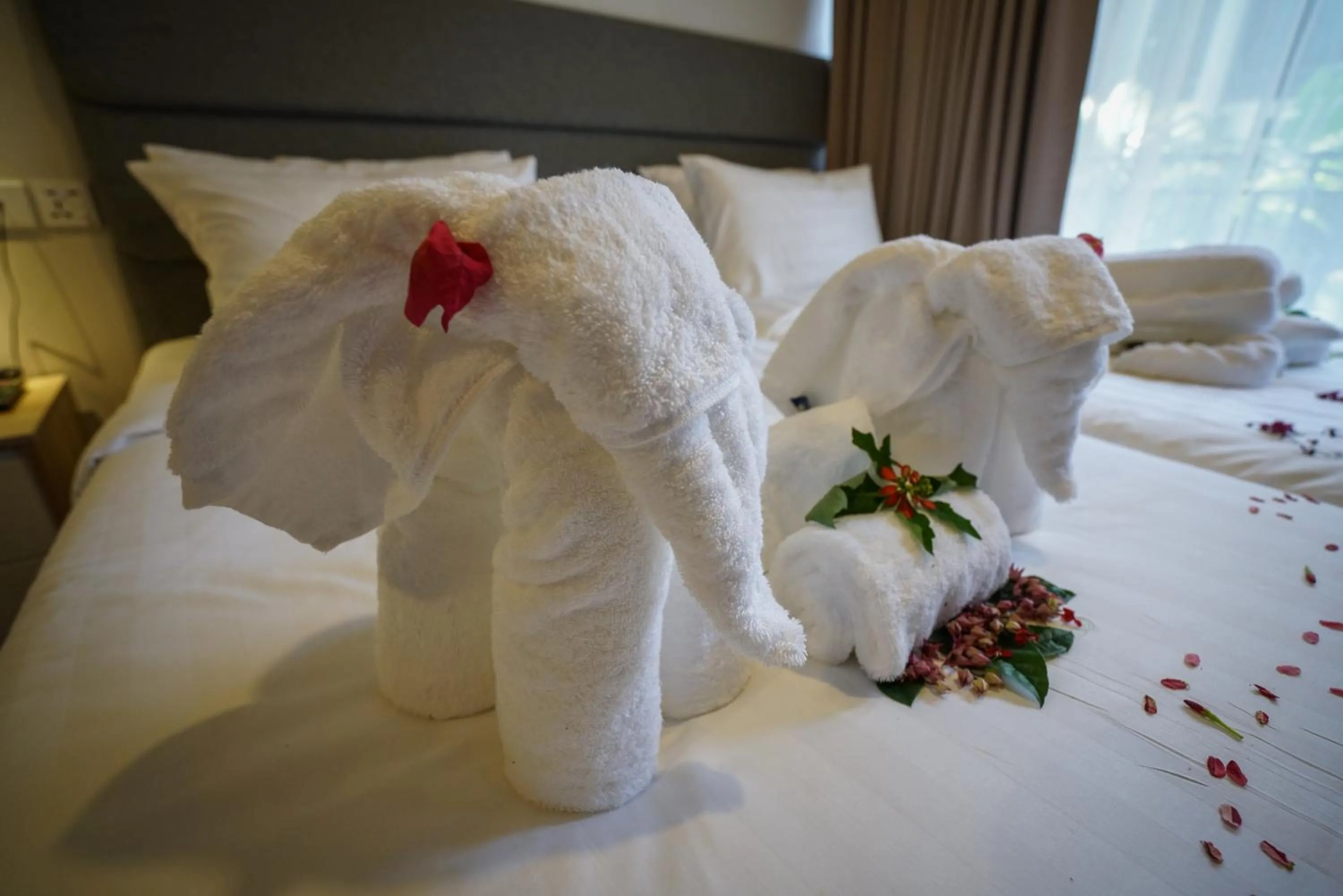 Bed in Aman Tioman Beach Resort