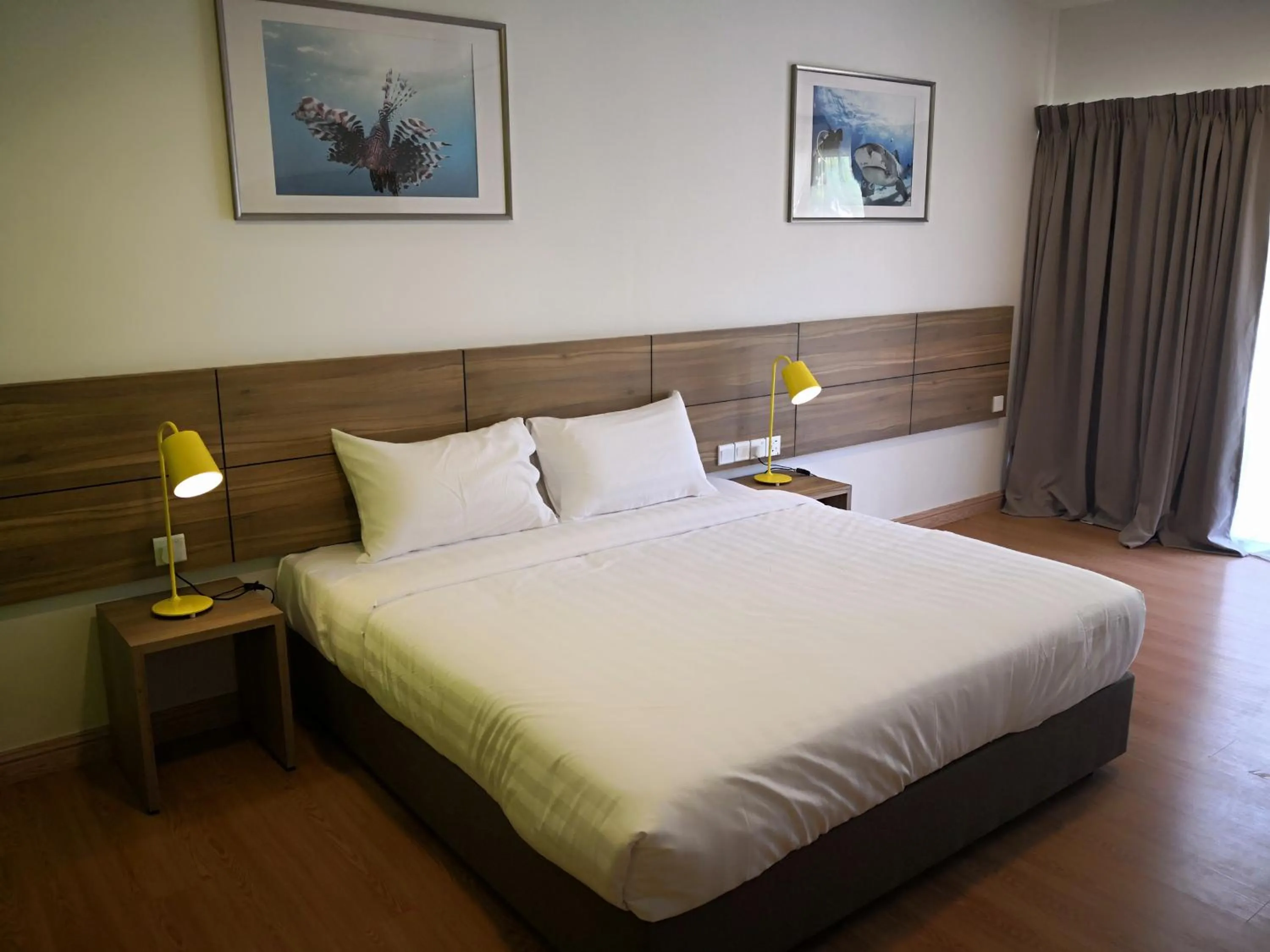 Bed in Aman Tioman Beach Resort