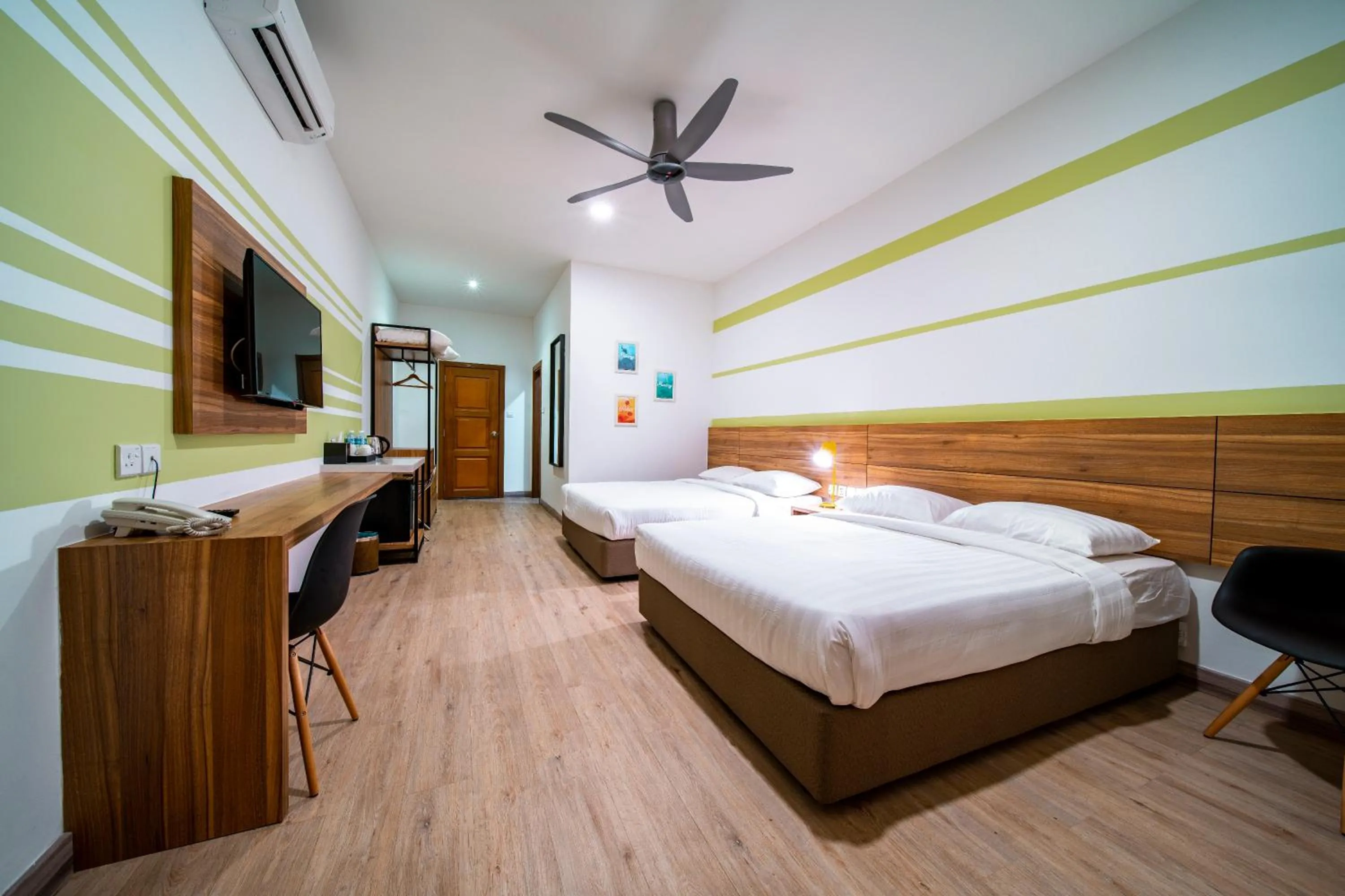 Bed in Aman Tioman Beach Resort