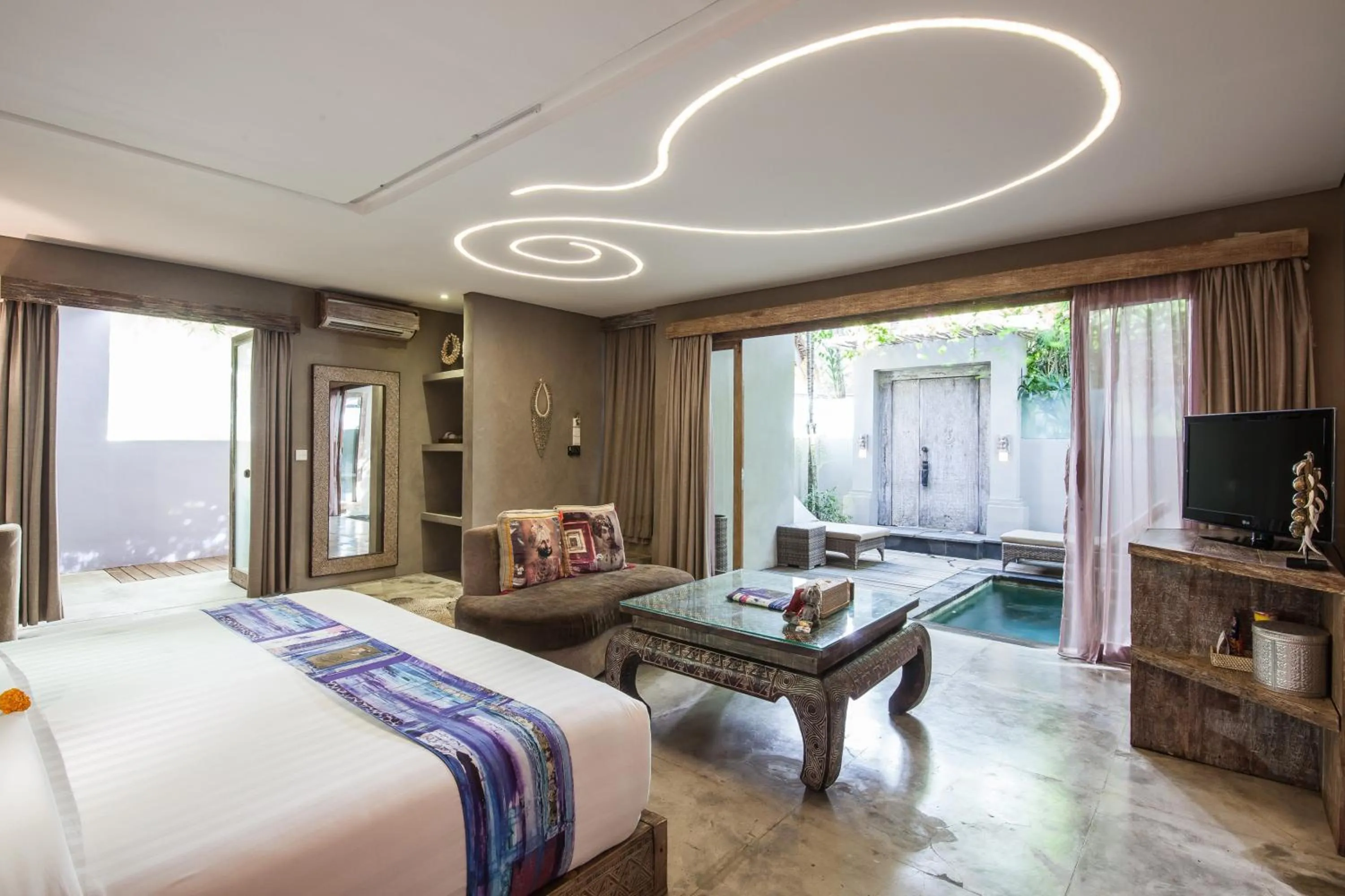 Swimming pool, Bed in Blue Karma Dijiwa Seminyak