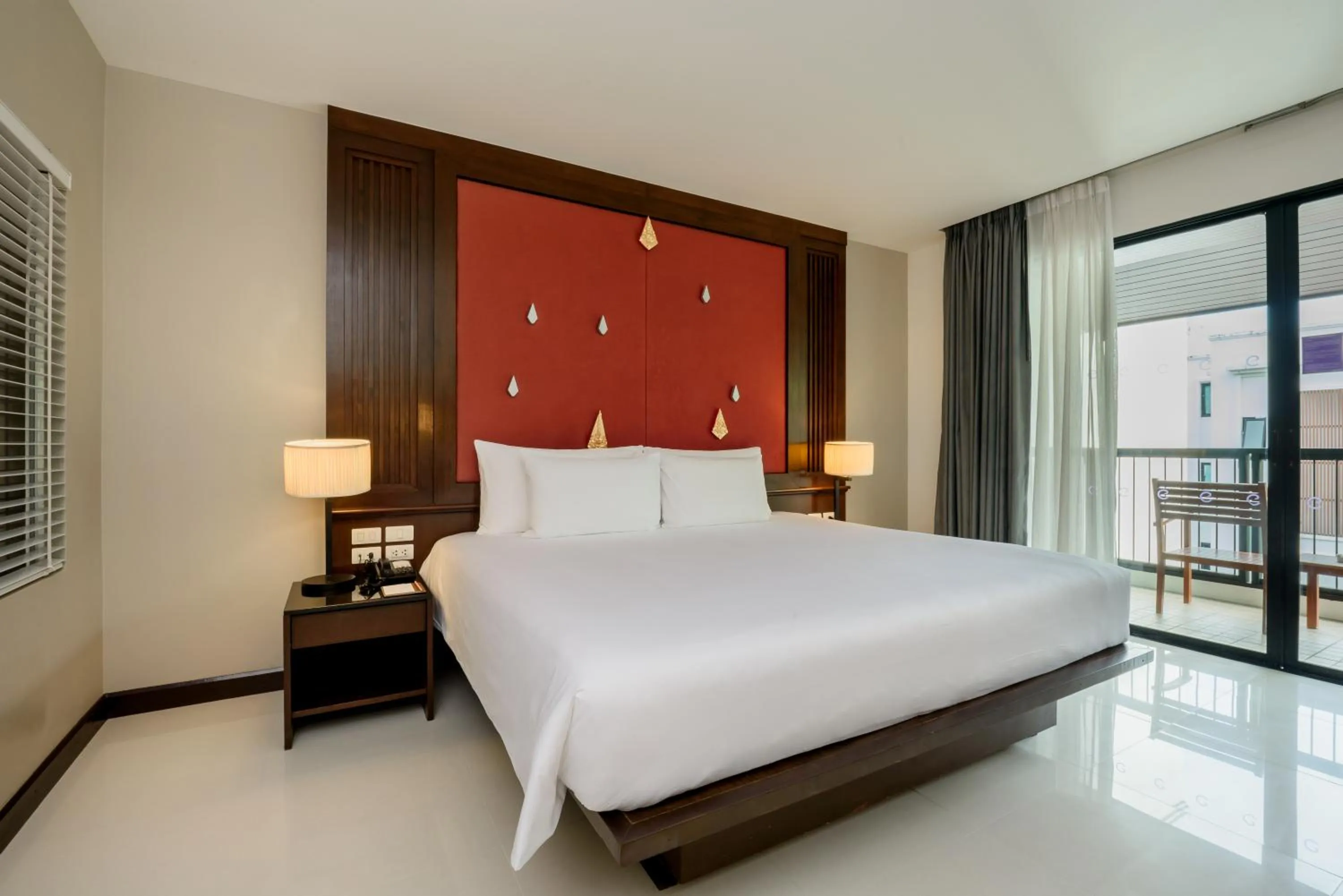 Bed in Centara Anda Dhevi Resort & Spa Krabi