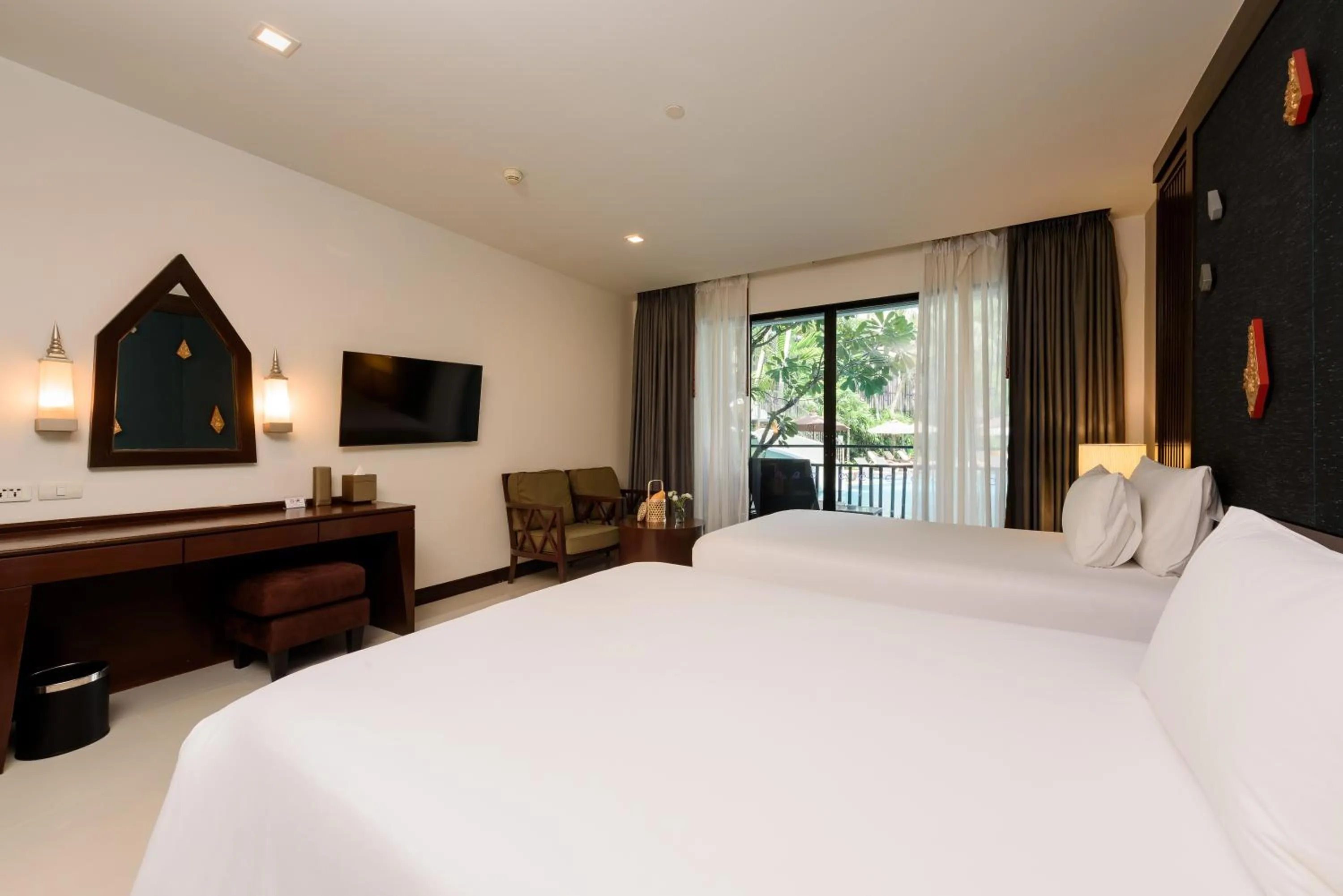 Bed in Centara Anda Dhevi Resort & Spa Krabi