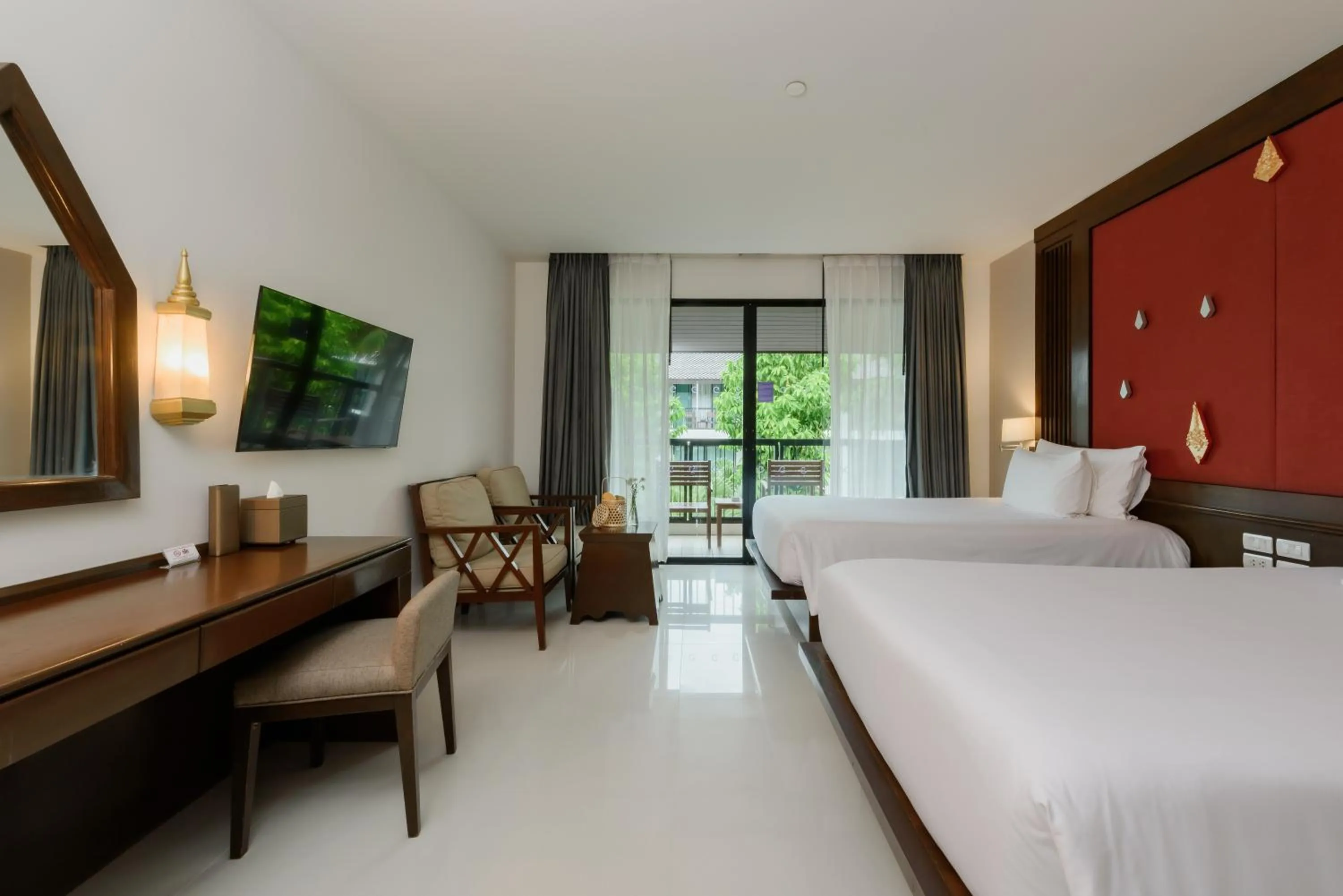 Bed in Centara Anda Dhevi Resort & Spa Krabi