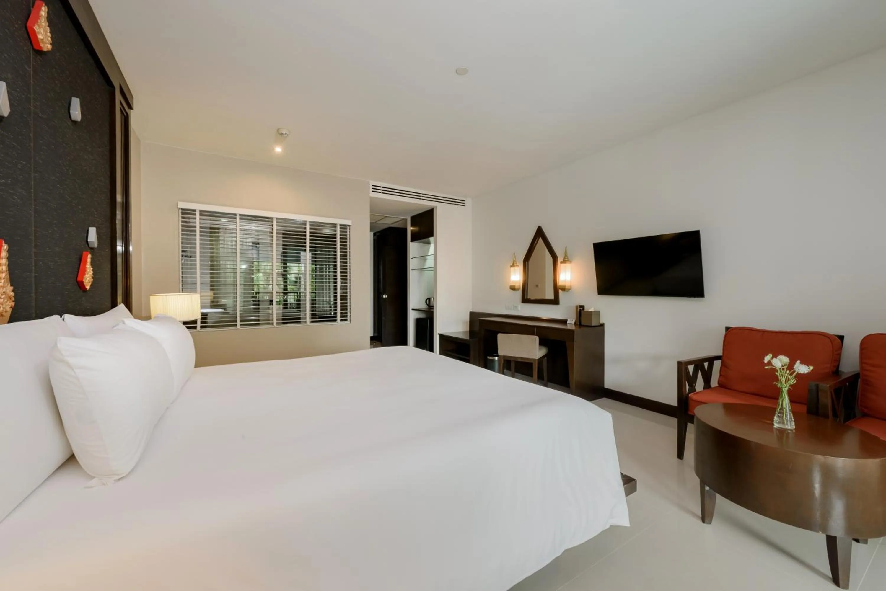 Bed in Centara Anda Dhevi Resort & Spa Krabi