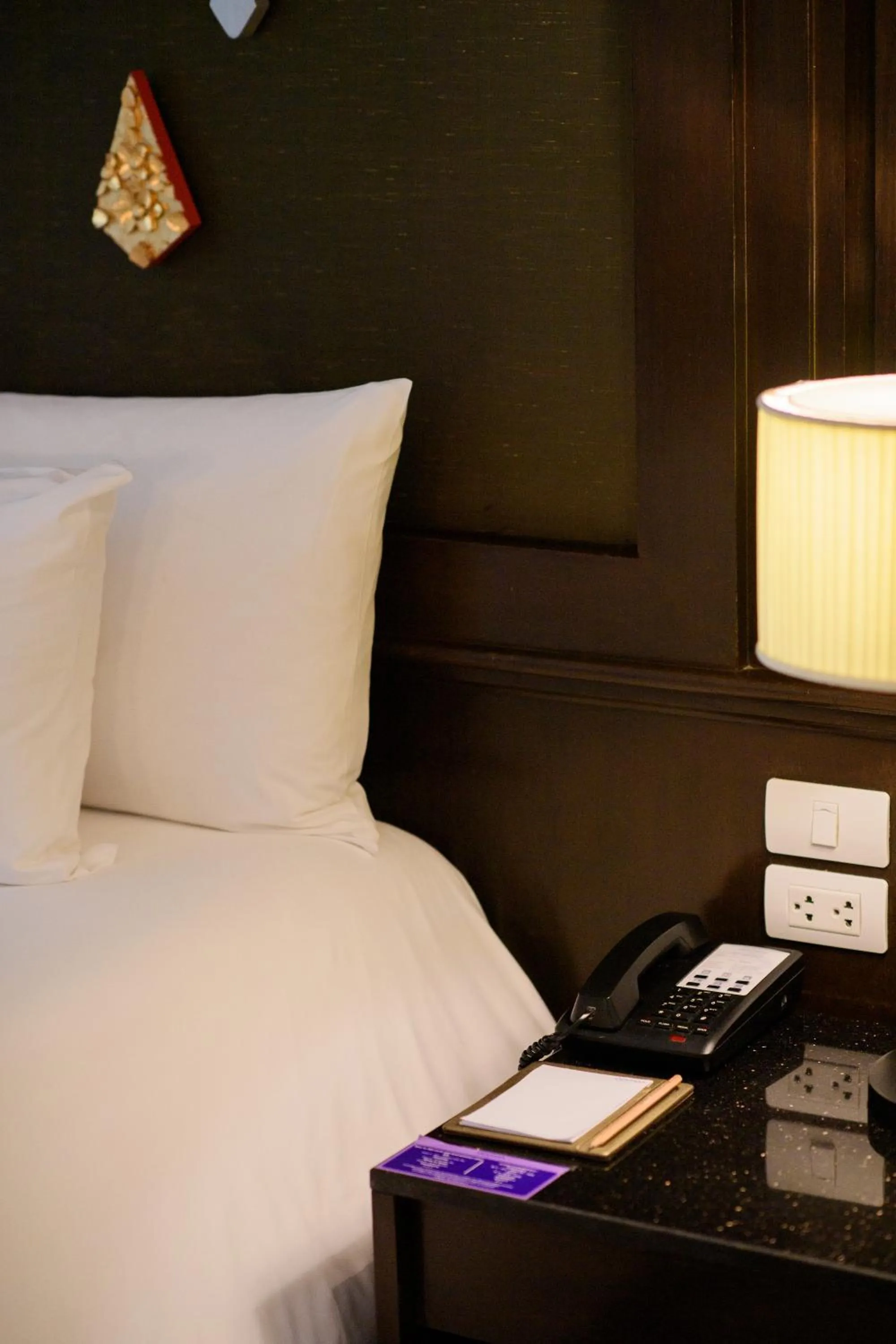 Bed in Centara Anda Dhevi Resort & Spa Krabi