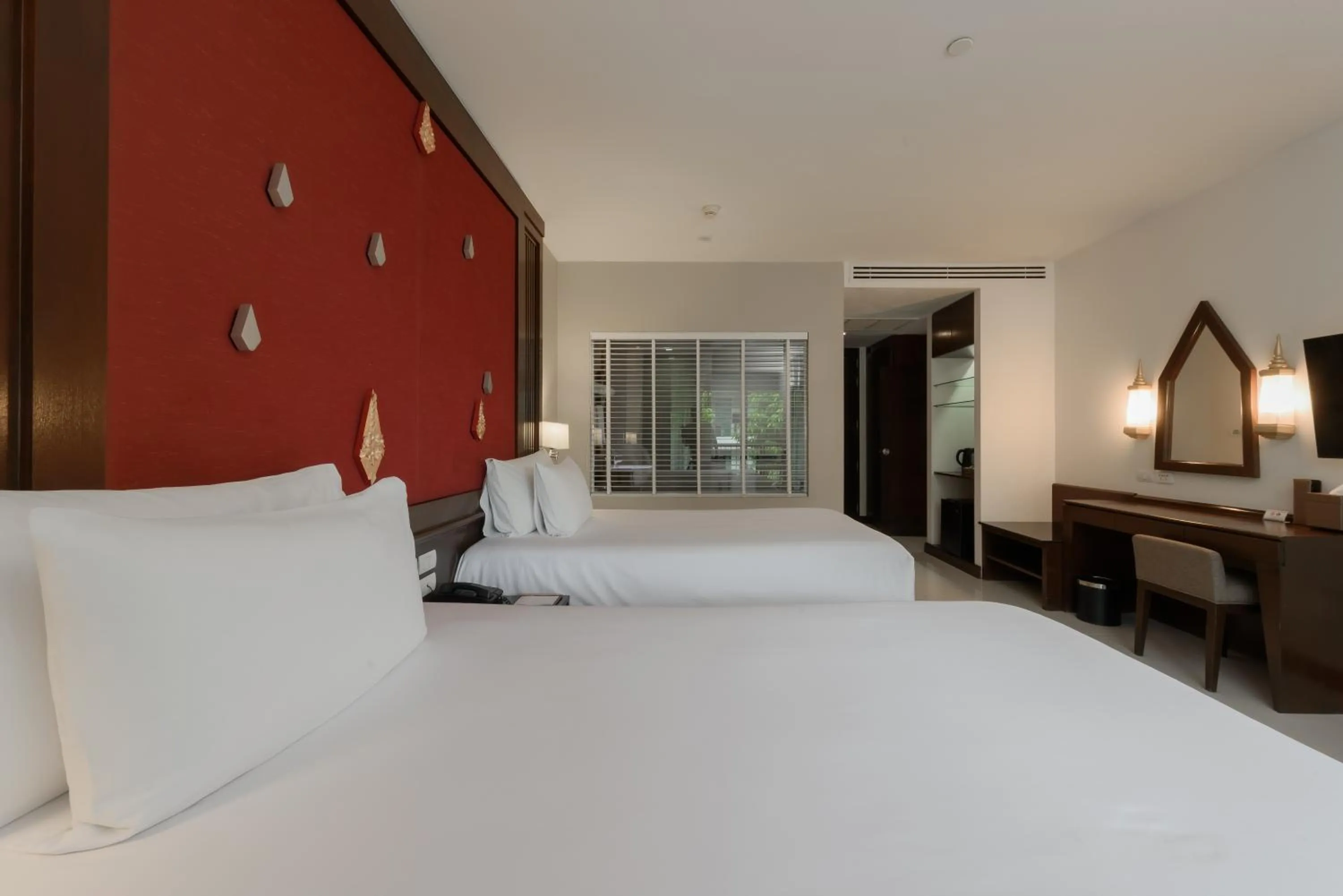 Bed in Centara Anda Dhevi Resort & Spa Krabi