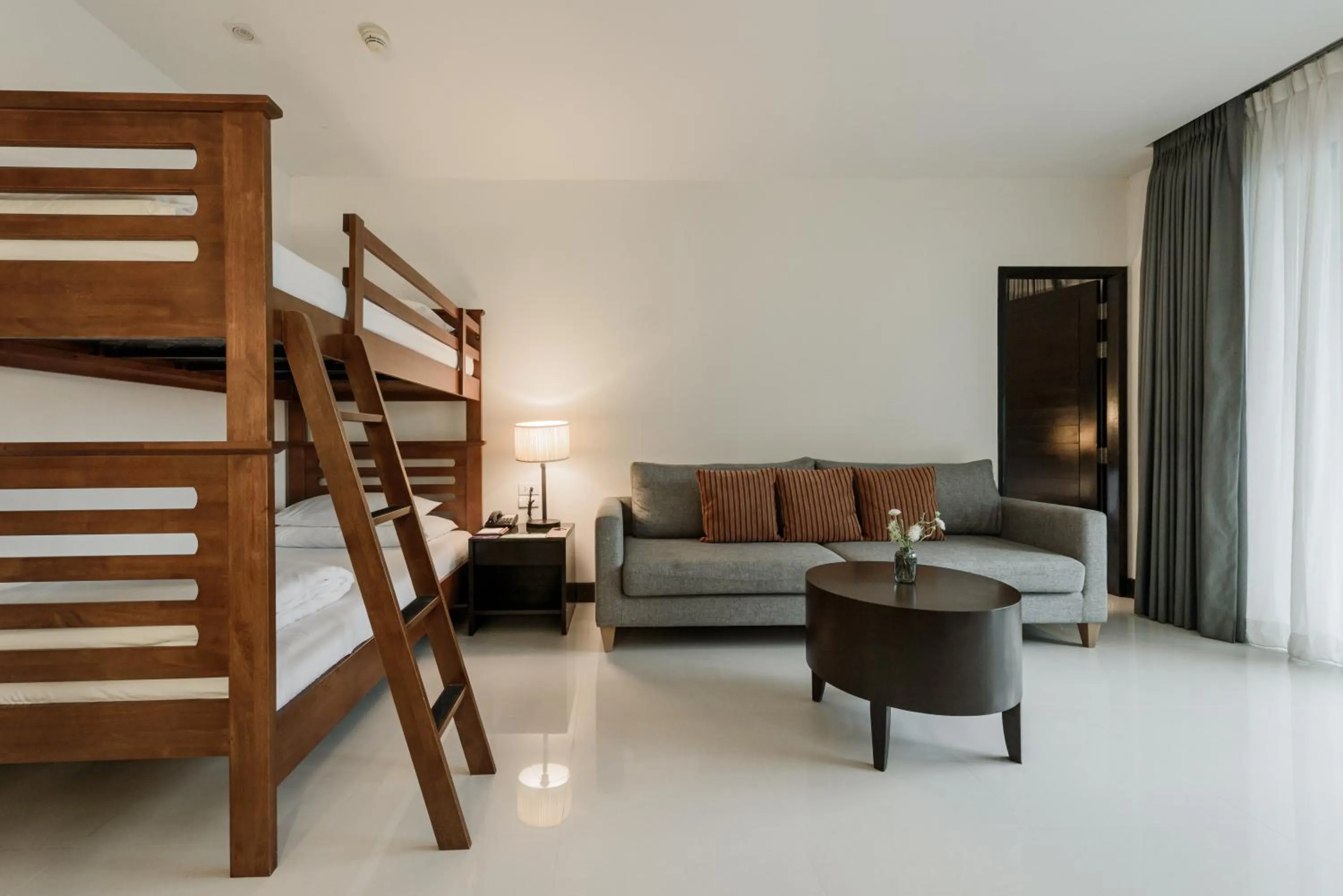 Bed in Centara Anda Dhevi Resort & Spa Krabi