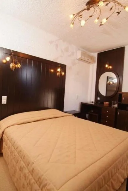 Bed in Hotel Taxiarches