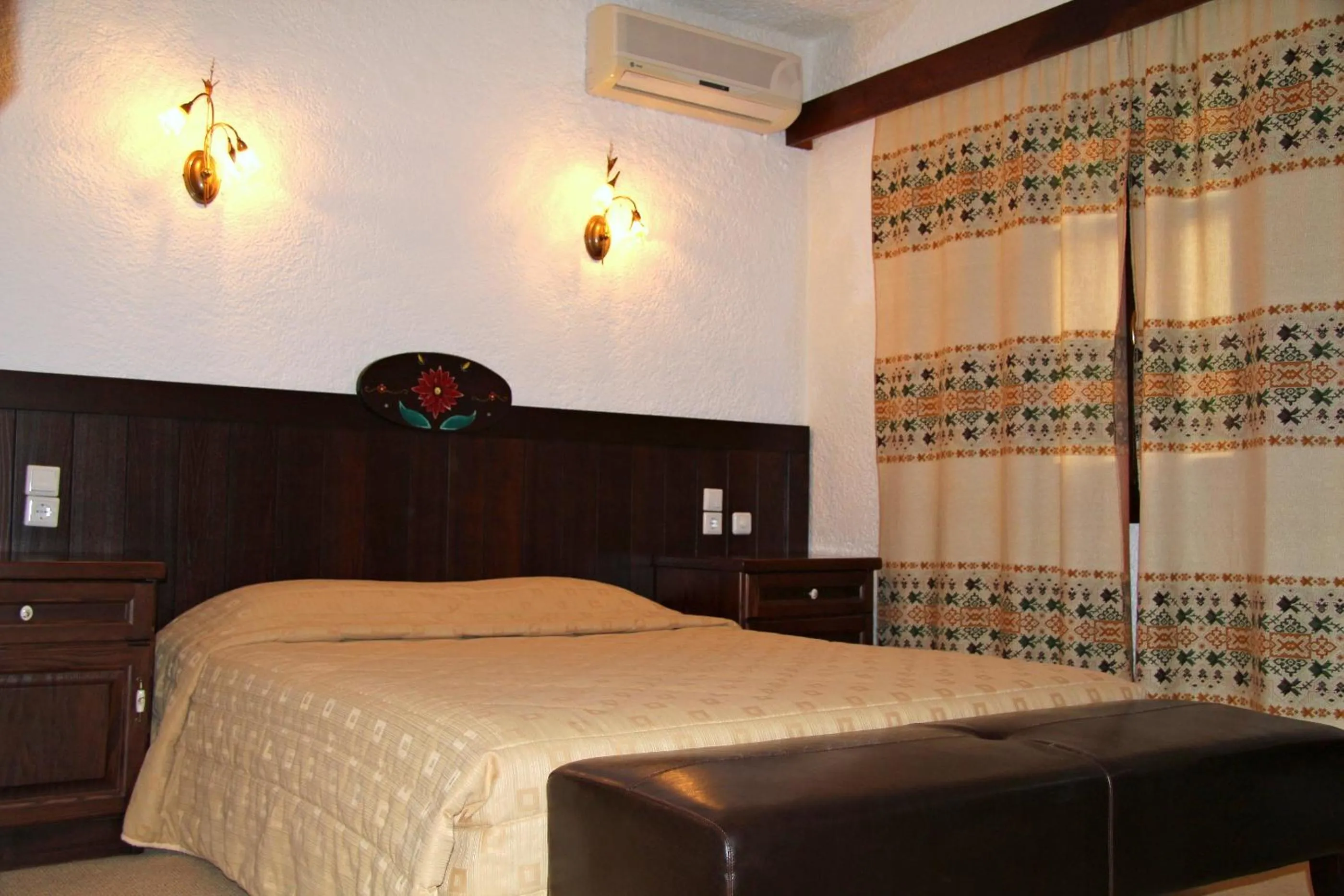 Bed in Hotel Taxiarches
