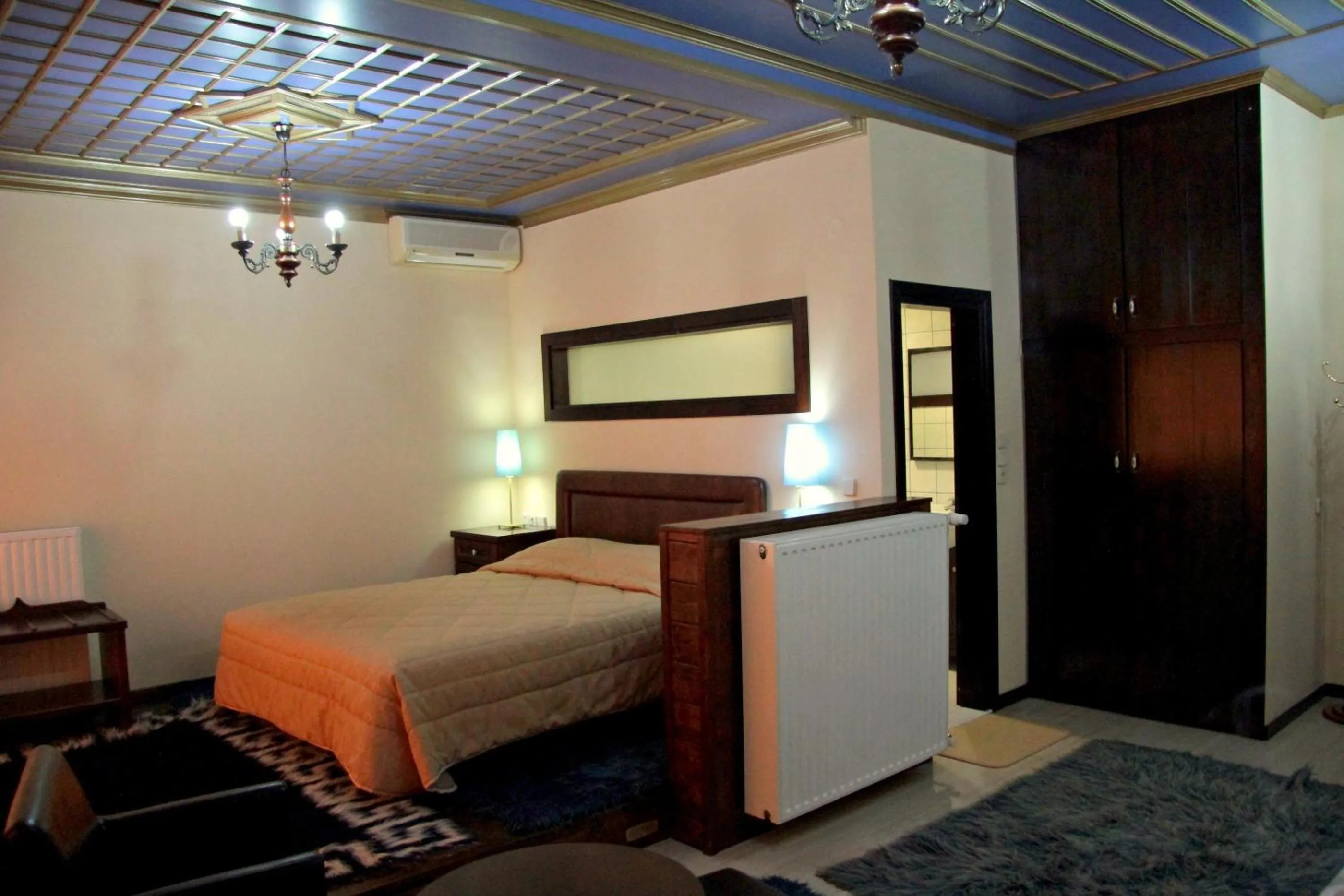 Bed in Hotel Taxiarches