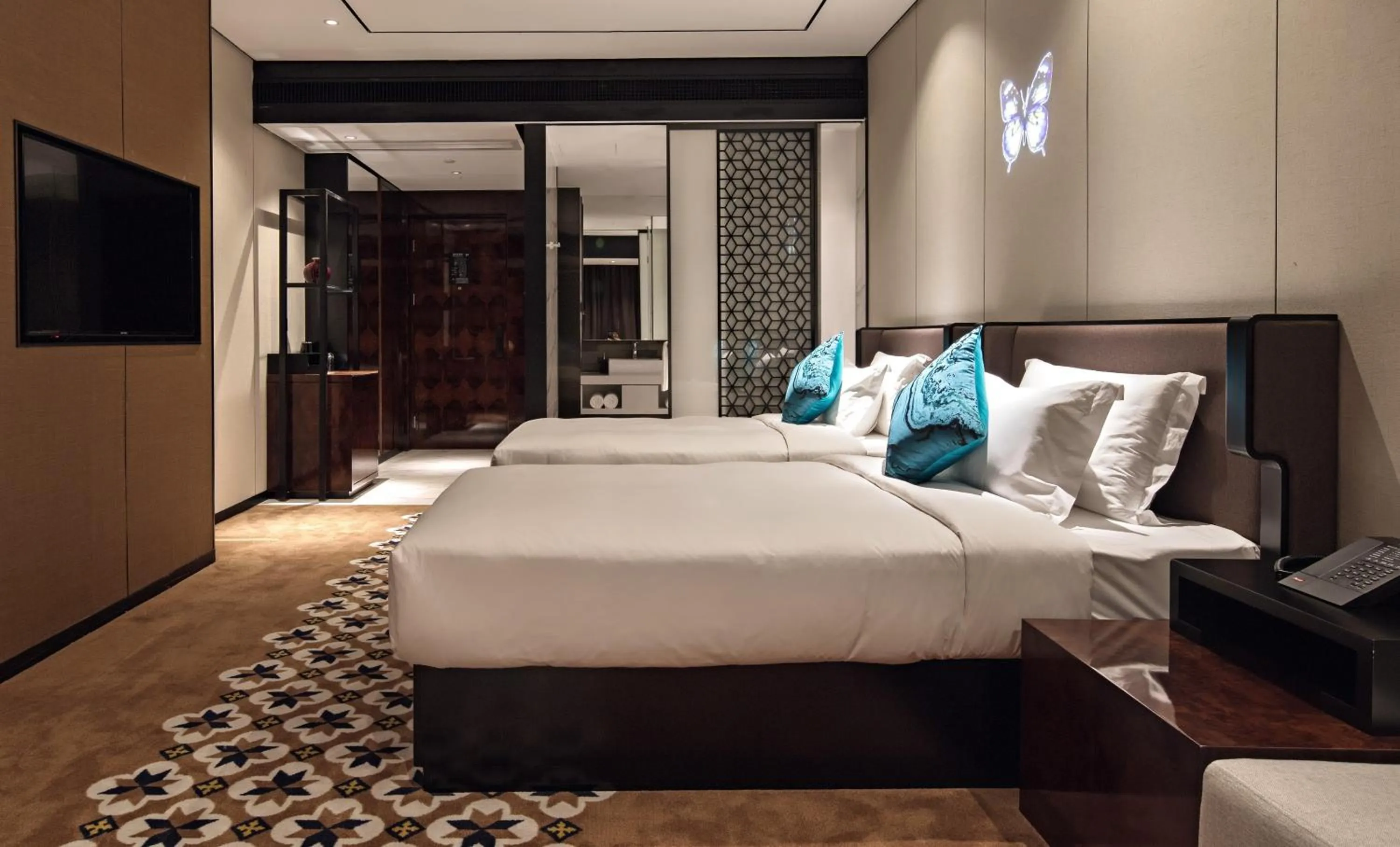 Bed in Paco Hotel Chebeinan Metro Guanghzou