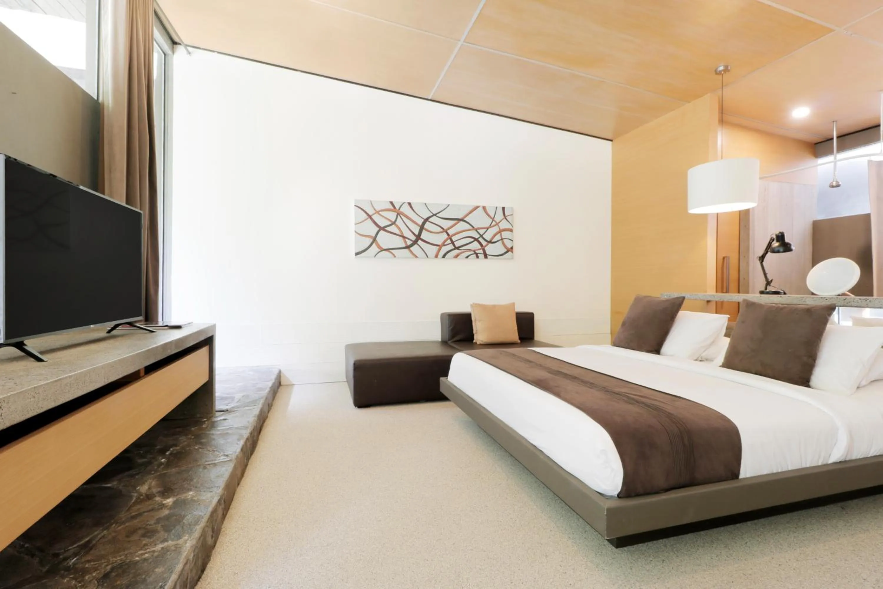 Bed in Clio Apartment