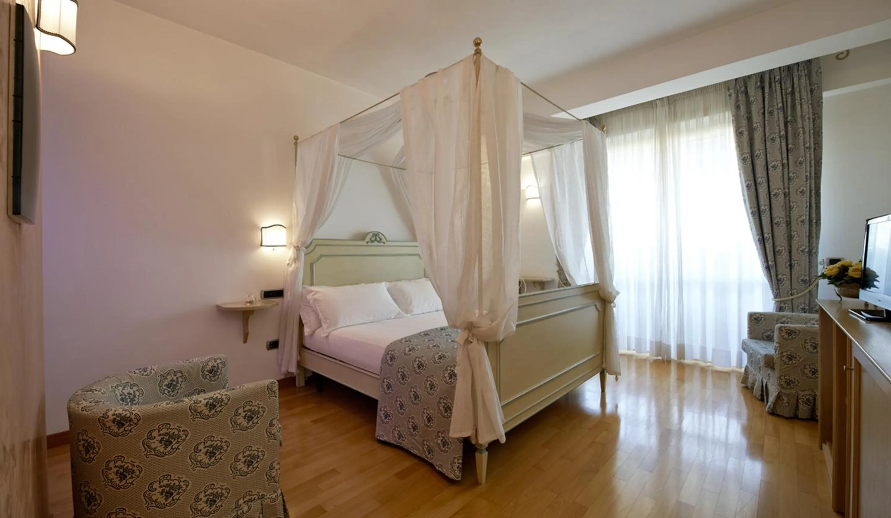 Bed in Villa Poseidon -Boutique Hotel-