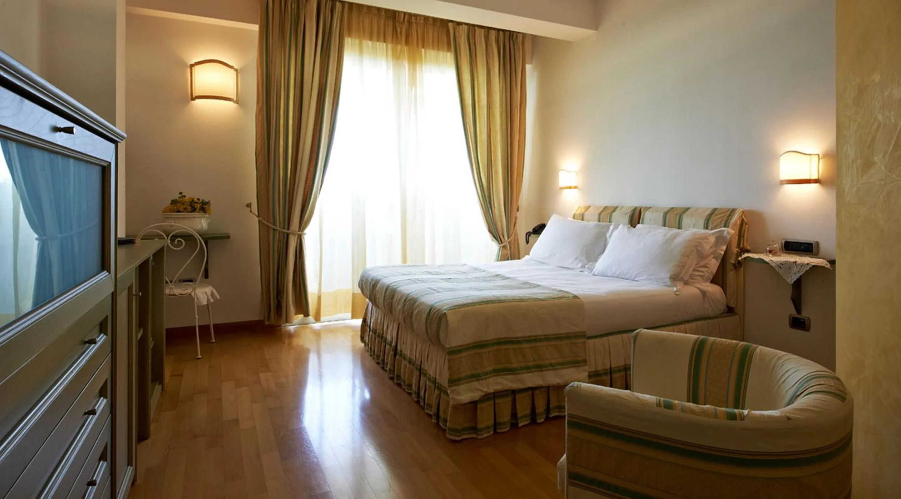 Bed in Villa Poseidon -Boutique Hotel-
