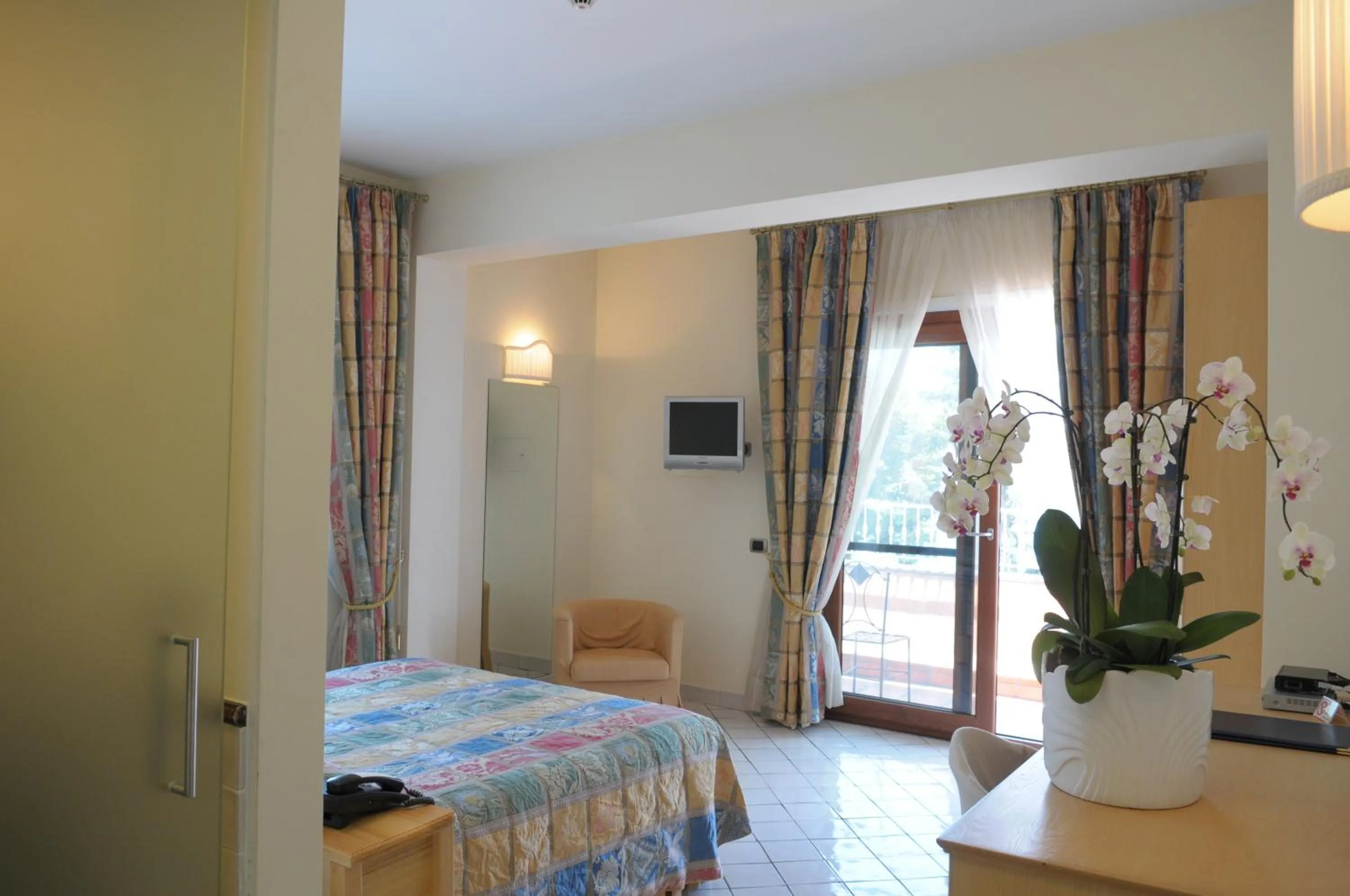 Bed in Villa Poseidon -Boutique Hotel-