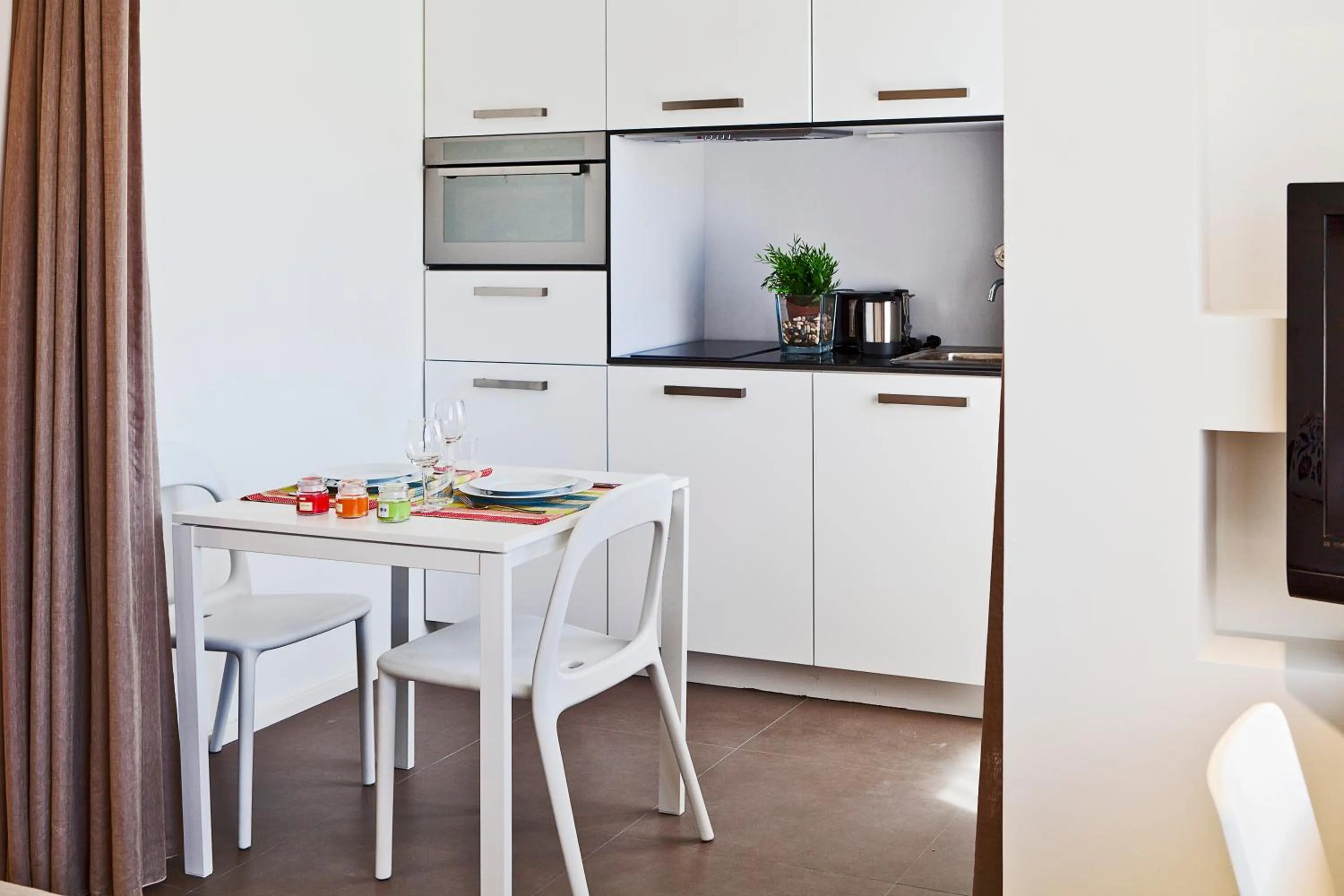 Kitchen or kitchenette in bnapartments Palacio