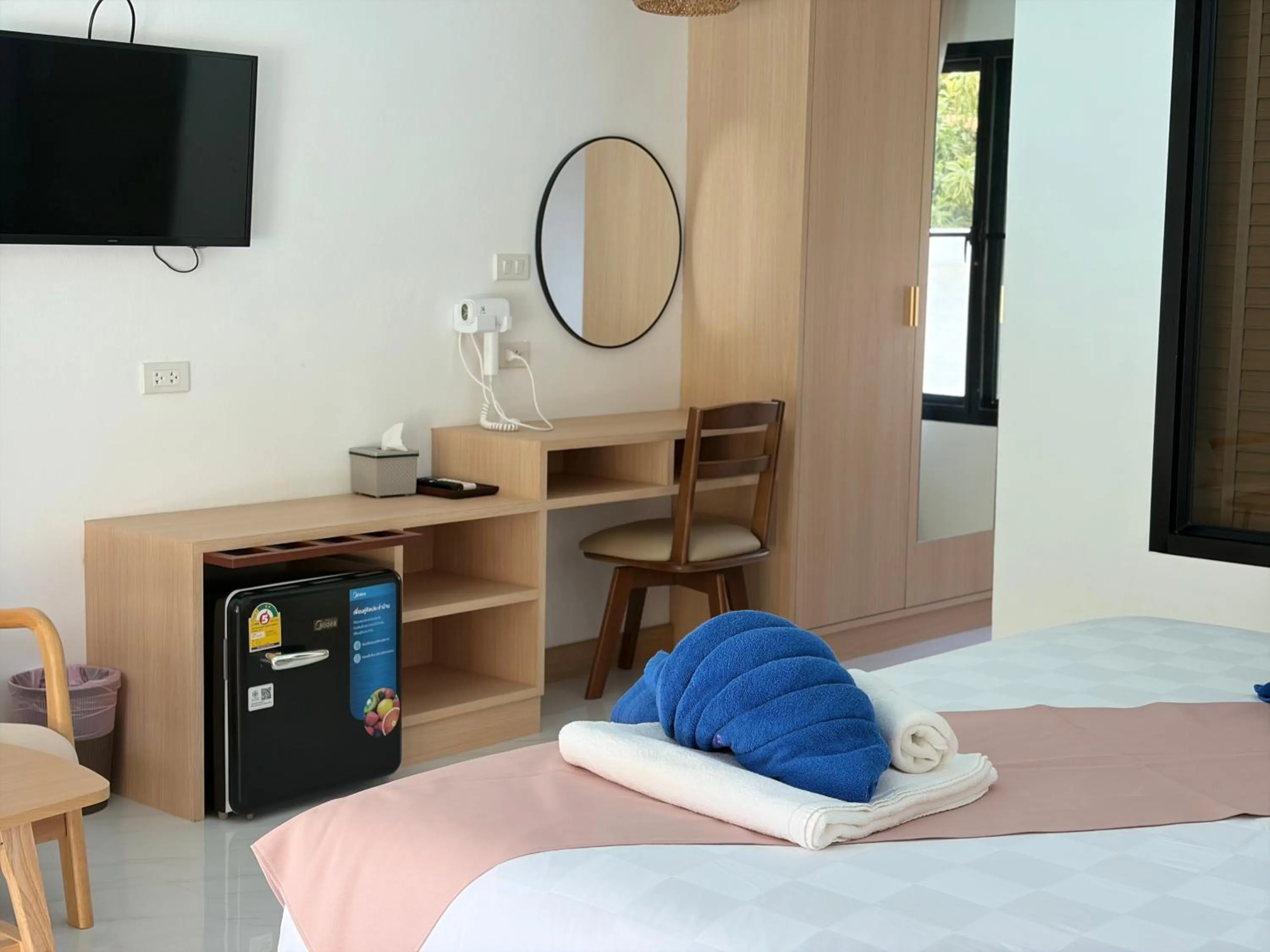 Bed in Pinky Bungalows Resort & Villa