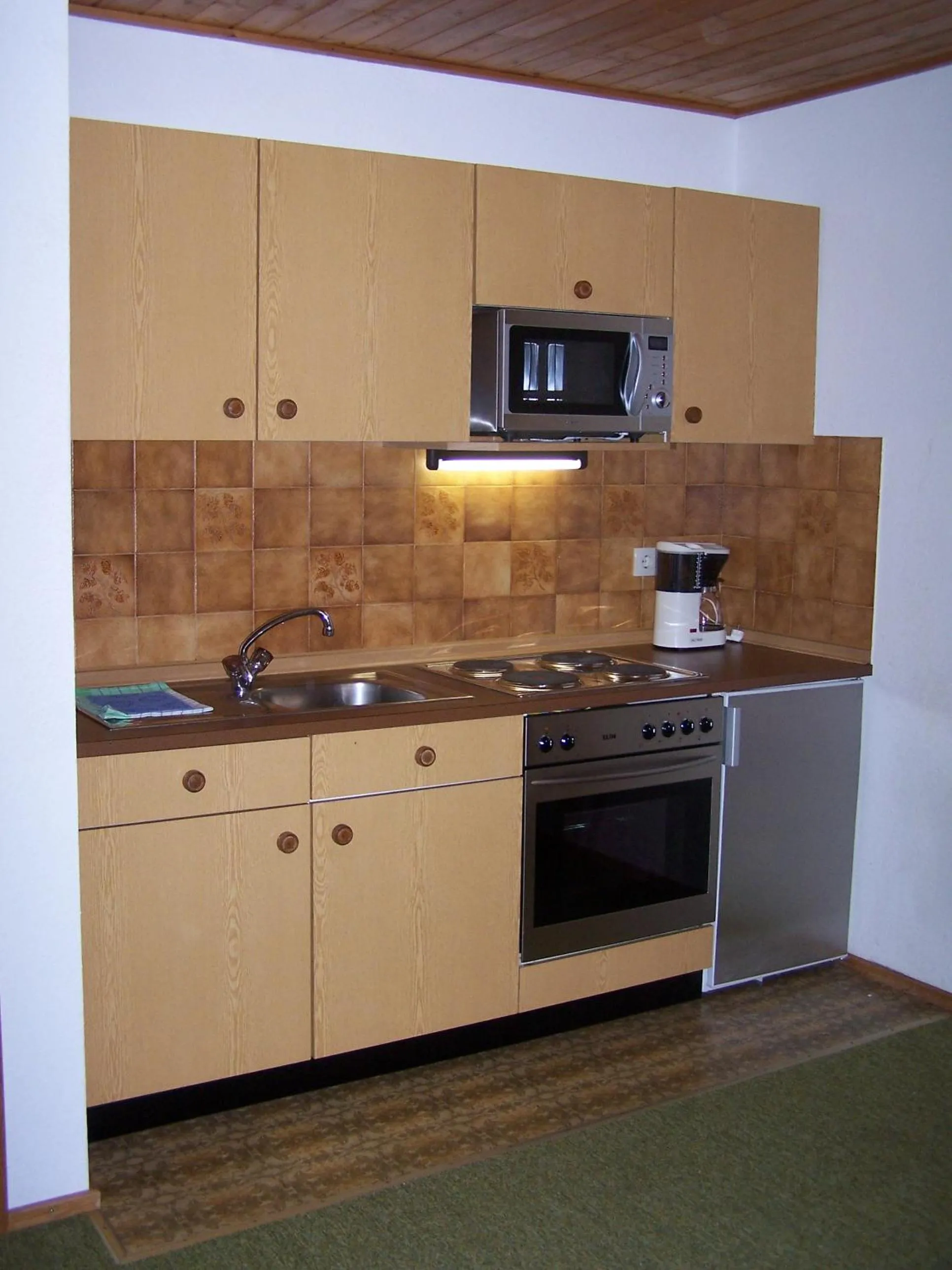 Kitchen or kitchenette in Ferienwohnung Ski-Hans