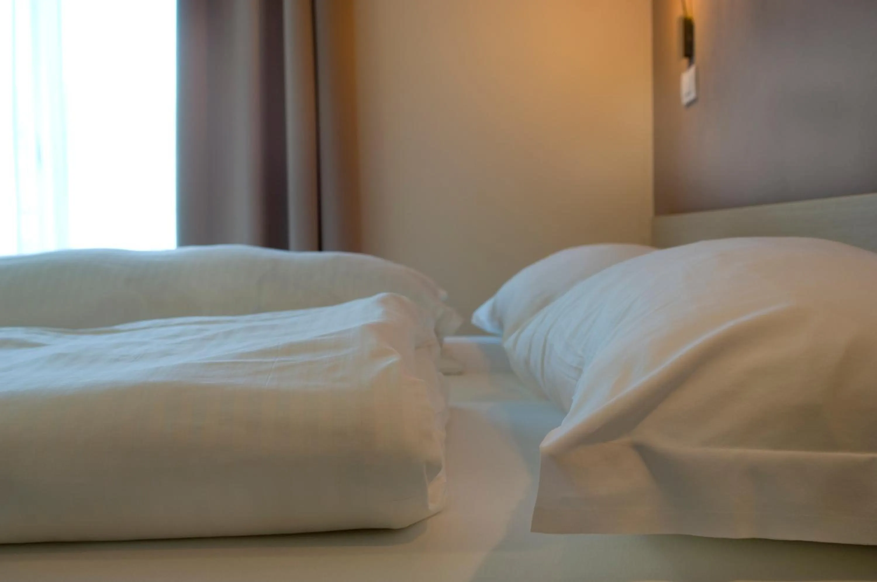 Bed in Hotel Weingarten