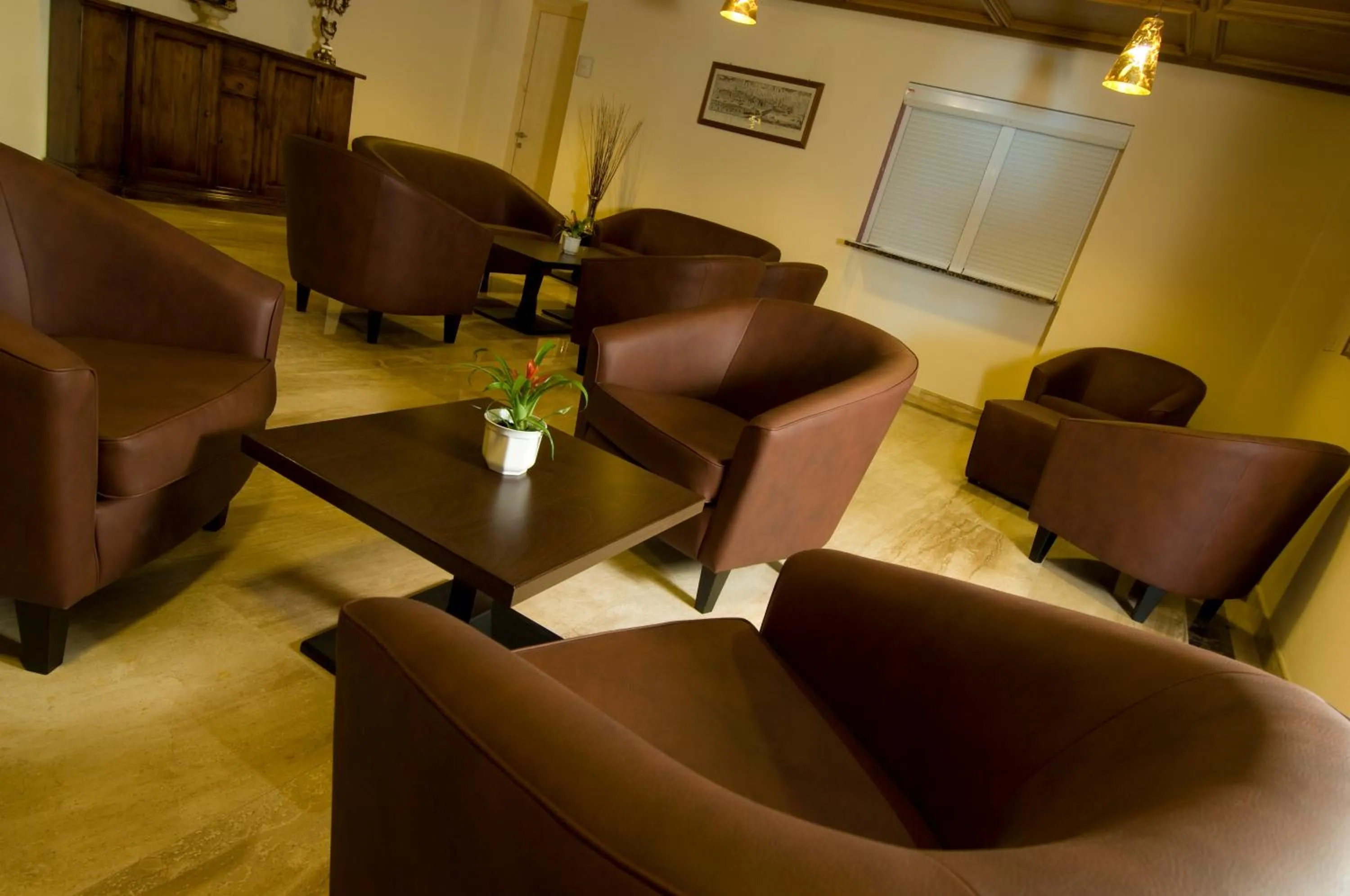 Communal lounge/ TV room in Hotel Weingarten