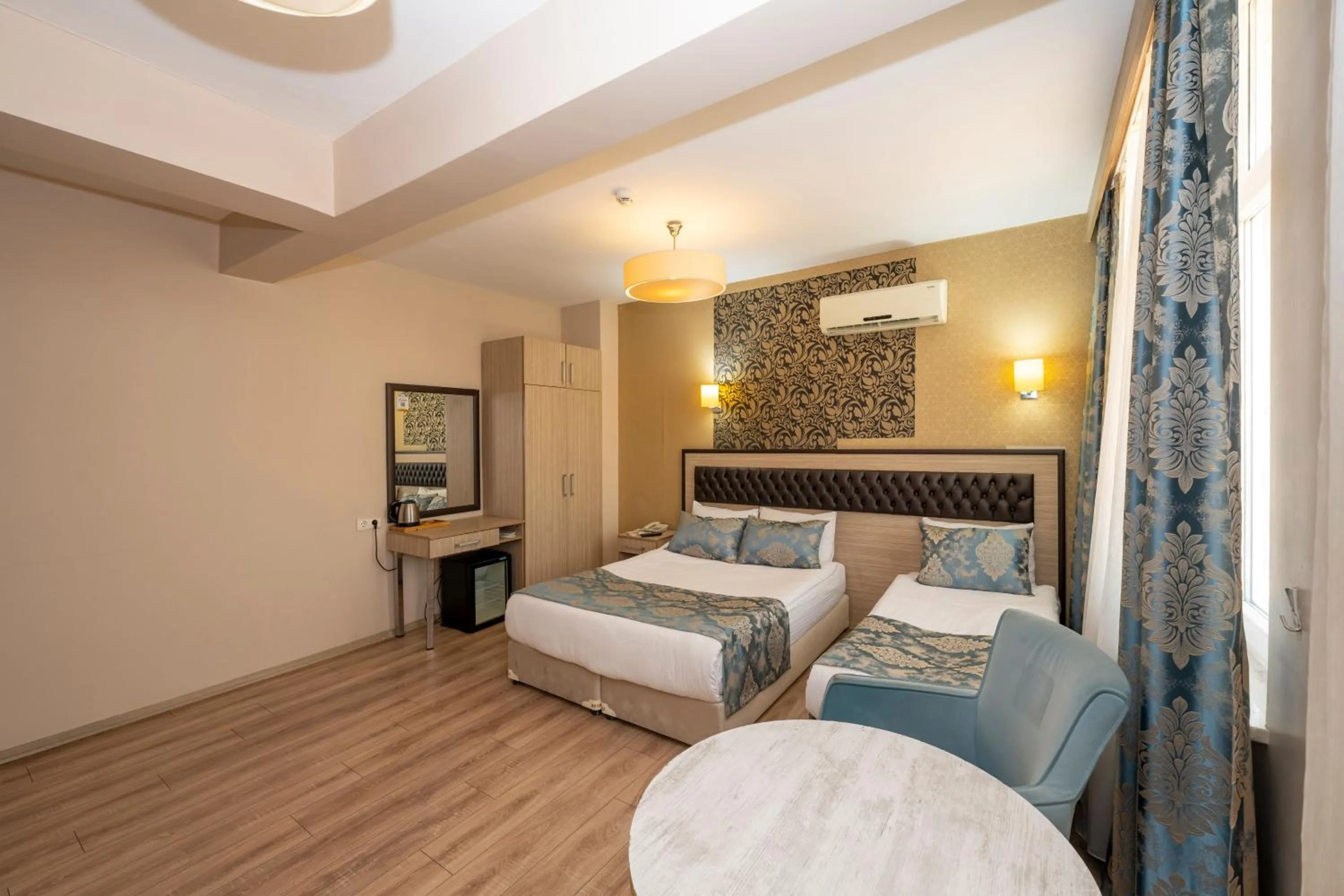 Photo of the whole room, Bed in Tugra Hotel