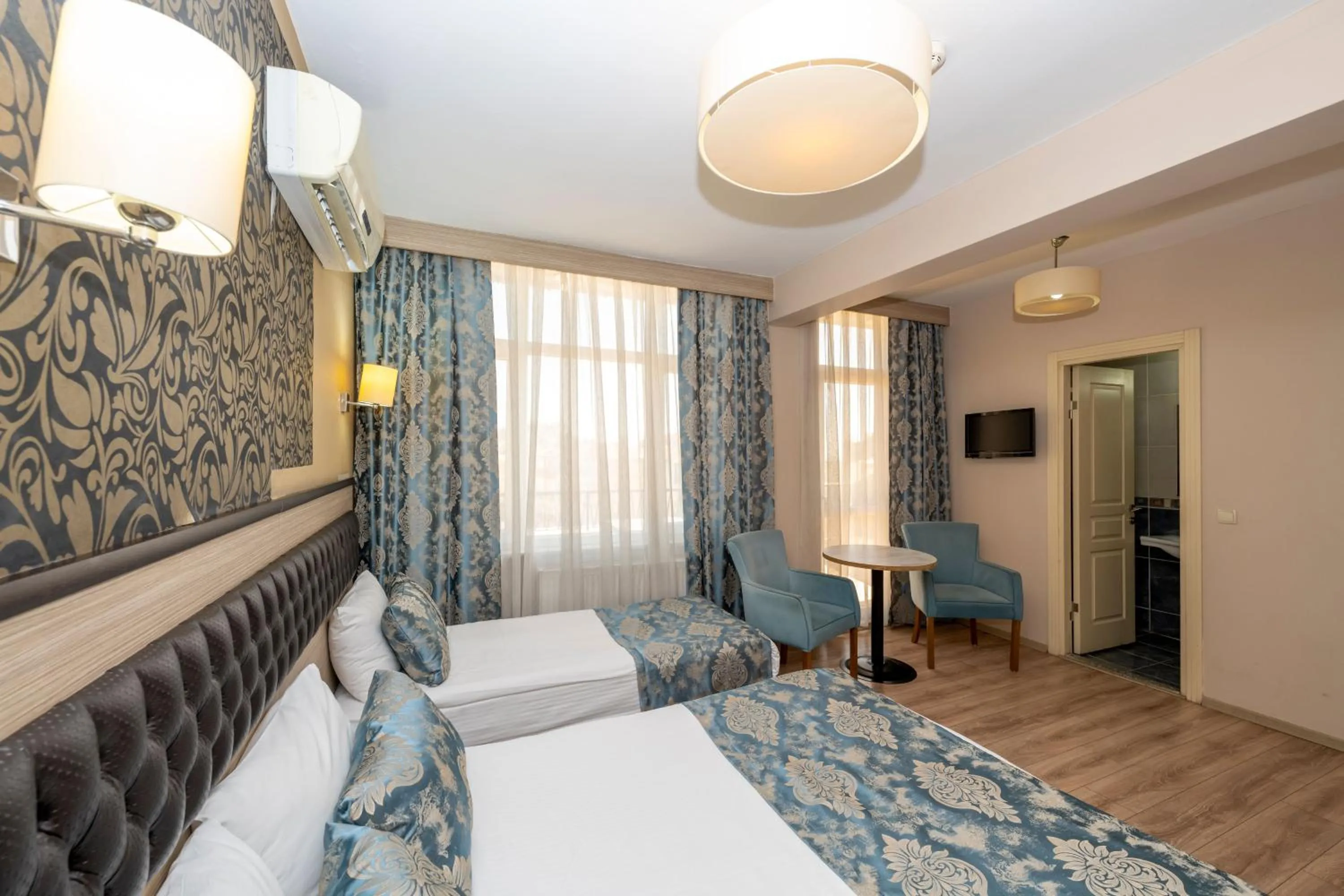 Photo of the whole room, Bed in Tugra Hotel