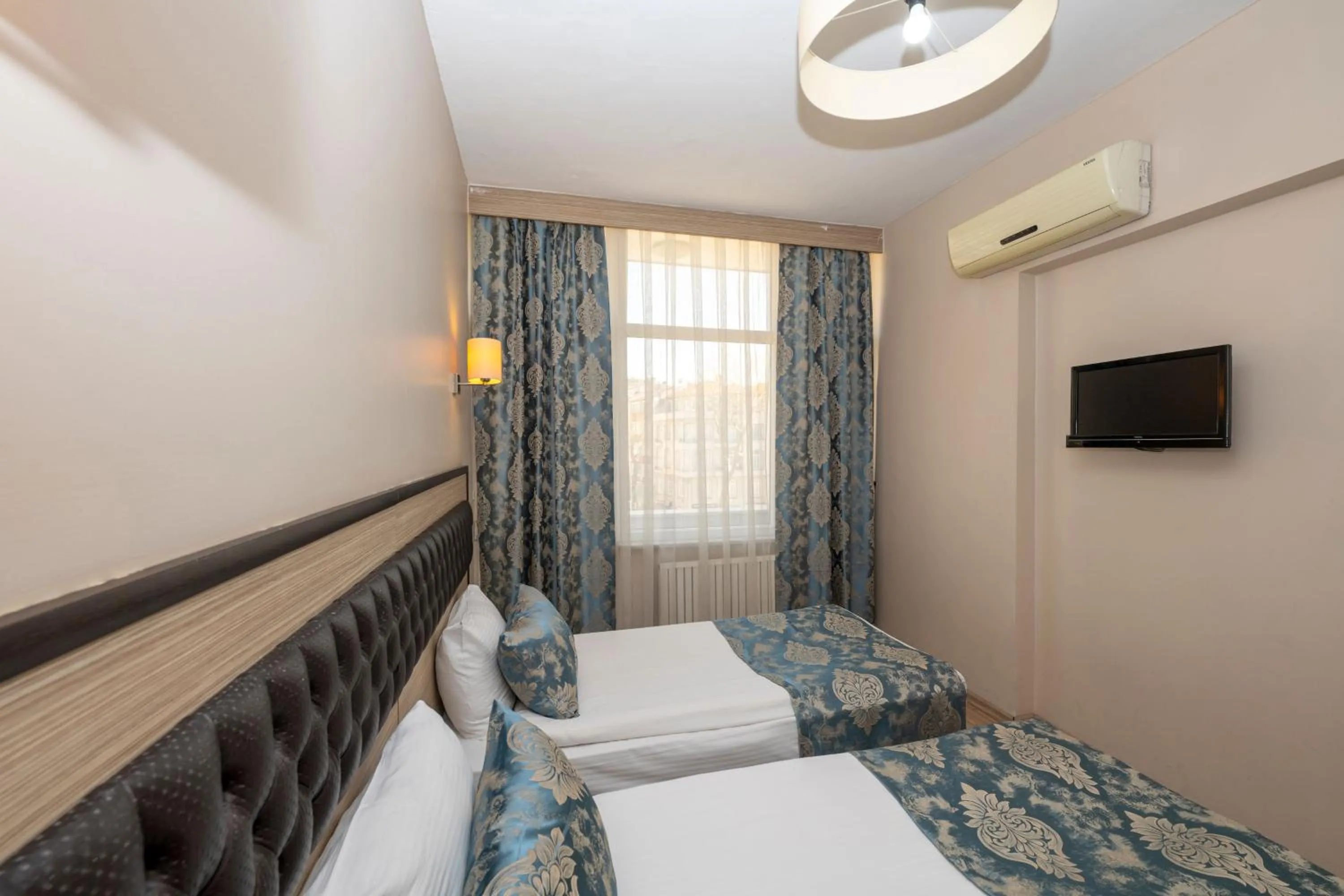 Photo of the whole room, Bed in Tugra Hotel