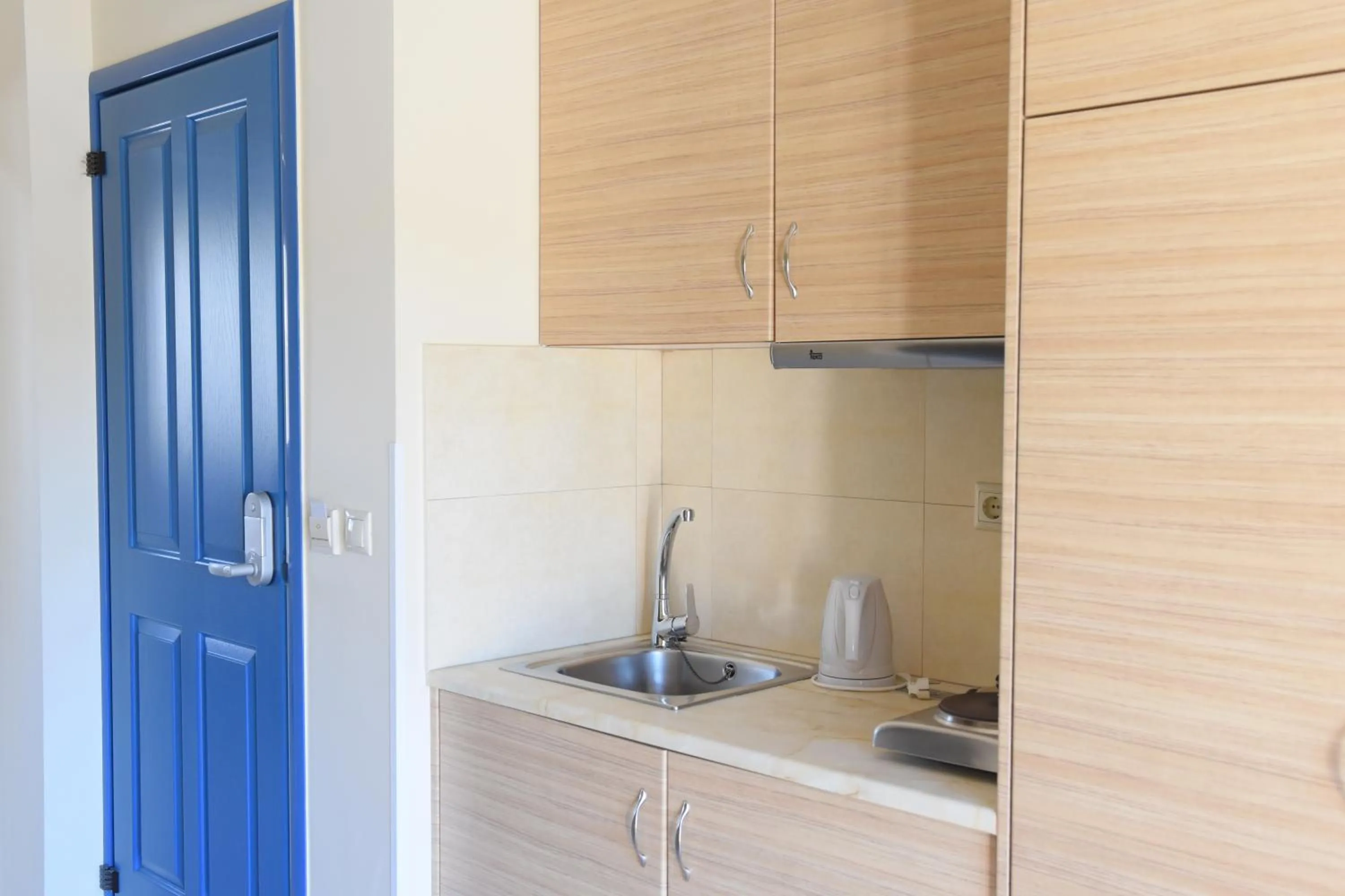 Kitchen or kitchenette in Emporios Bay Hotel Chios