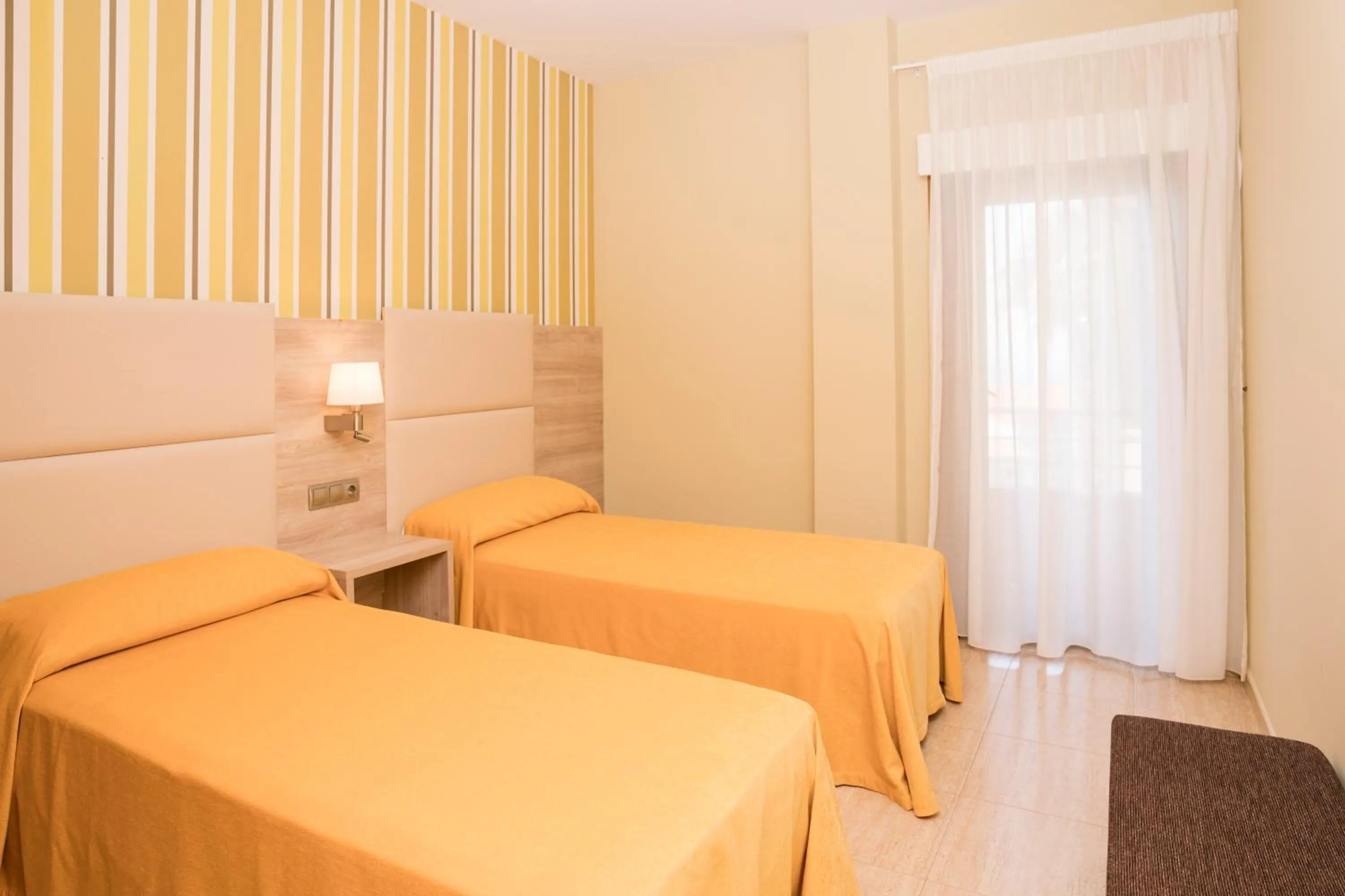 Bed in Apartamentos Atlántico Resort