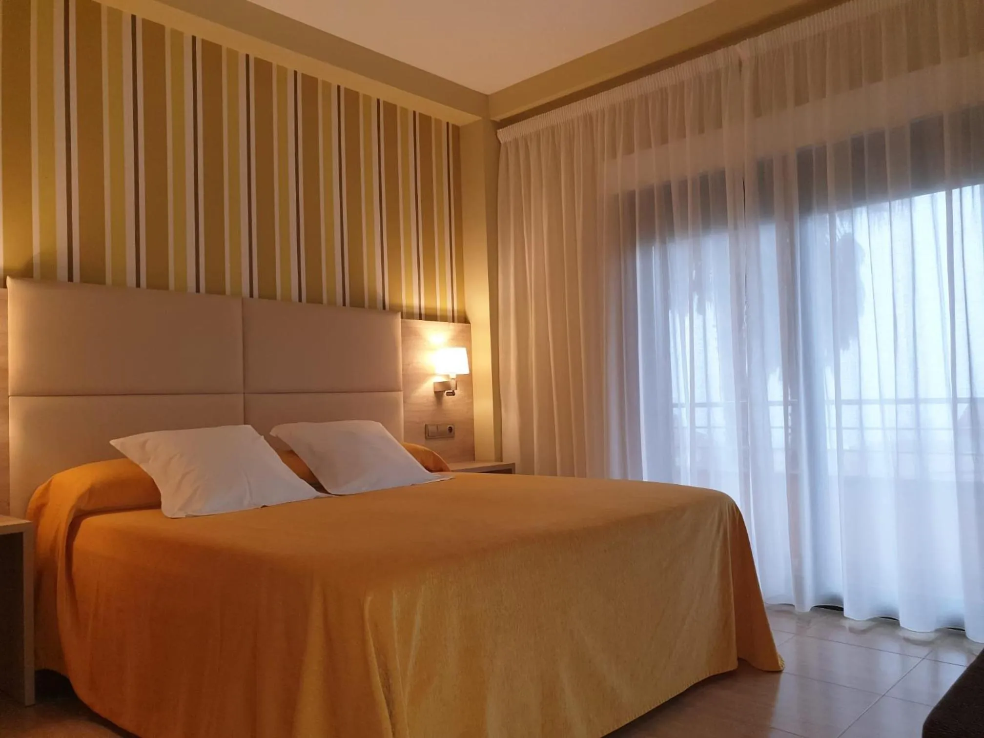 Bed in Apartamentos Atlántico Resort