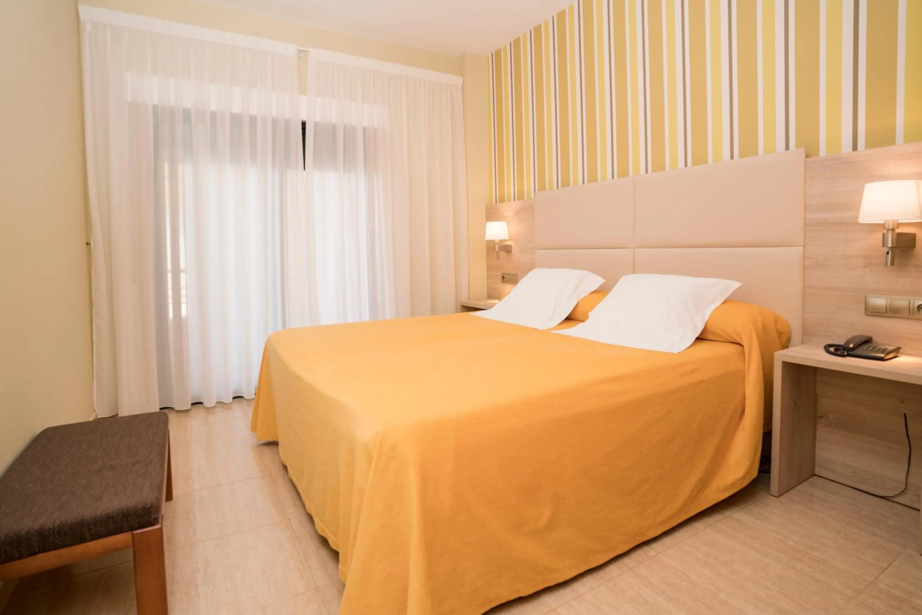 Bed in Apartamentos Atlántico Resort