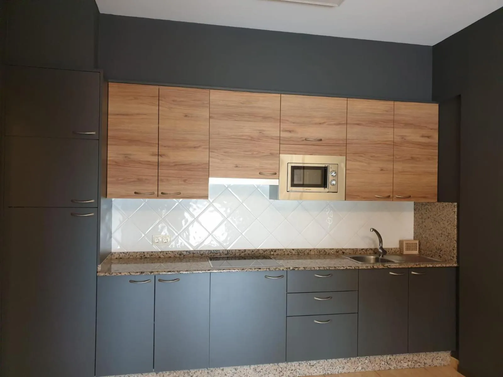 Kitchen or kitchenette in Apartamentos Atlántico Resort