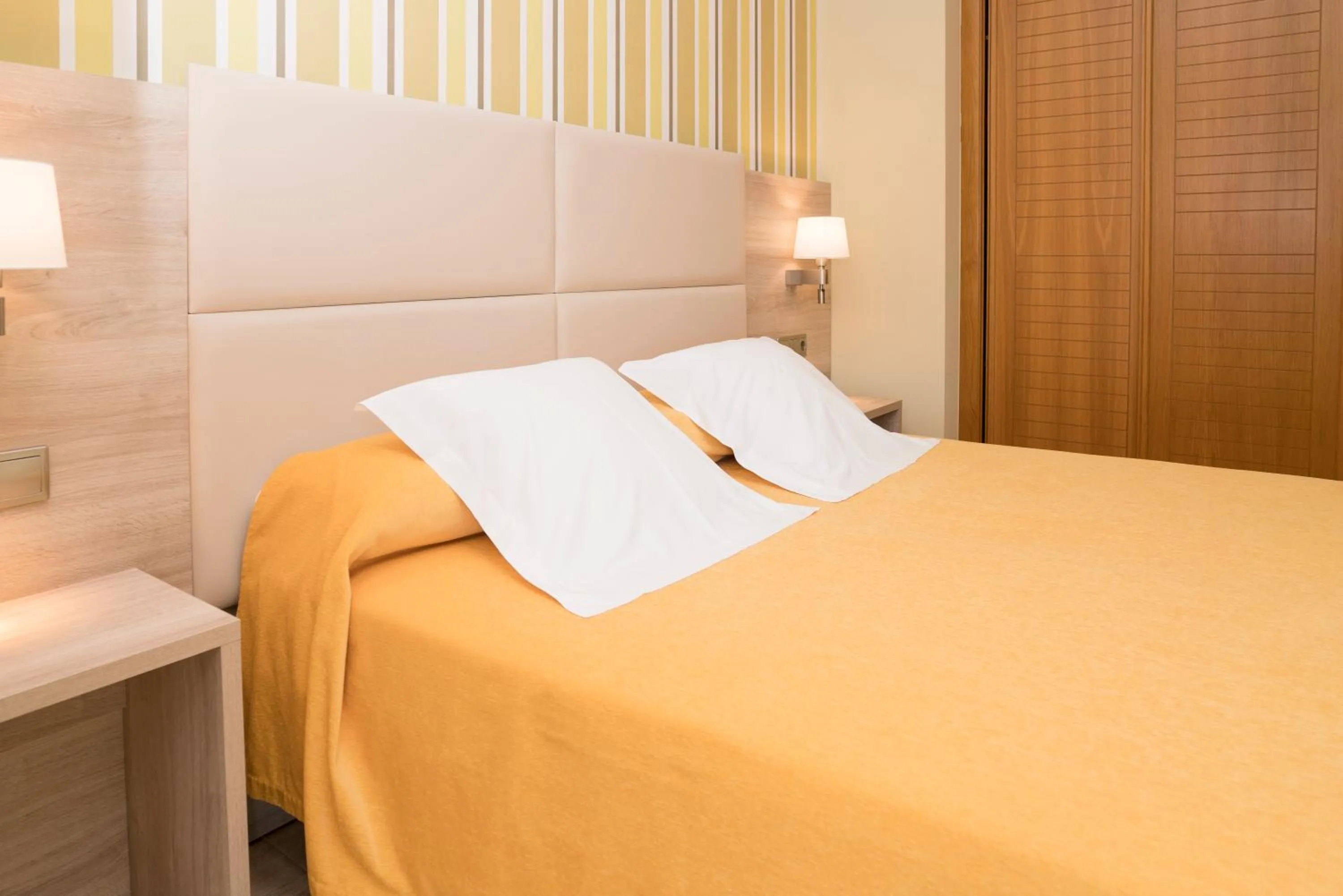 Bed in Apartamentos Atlántico Resort