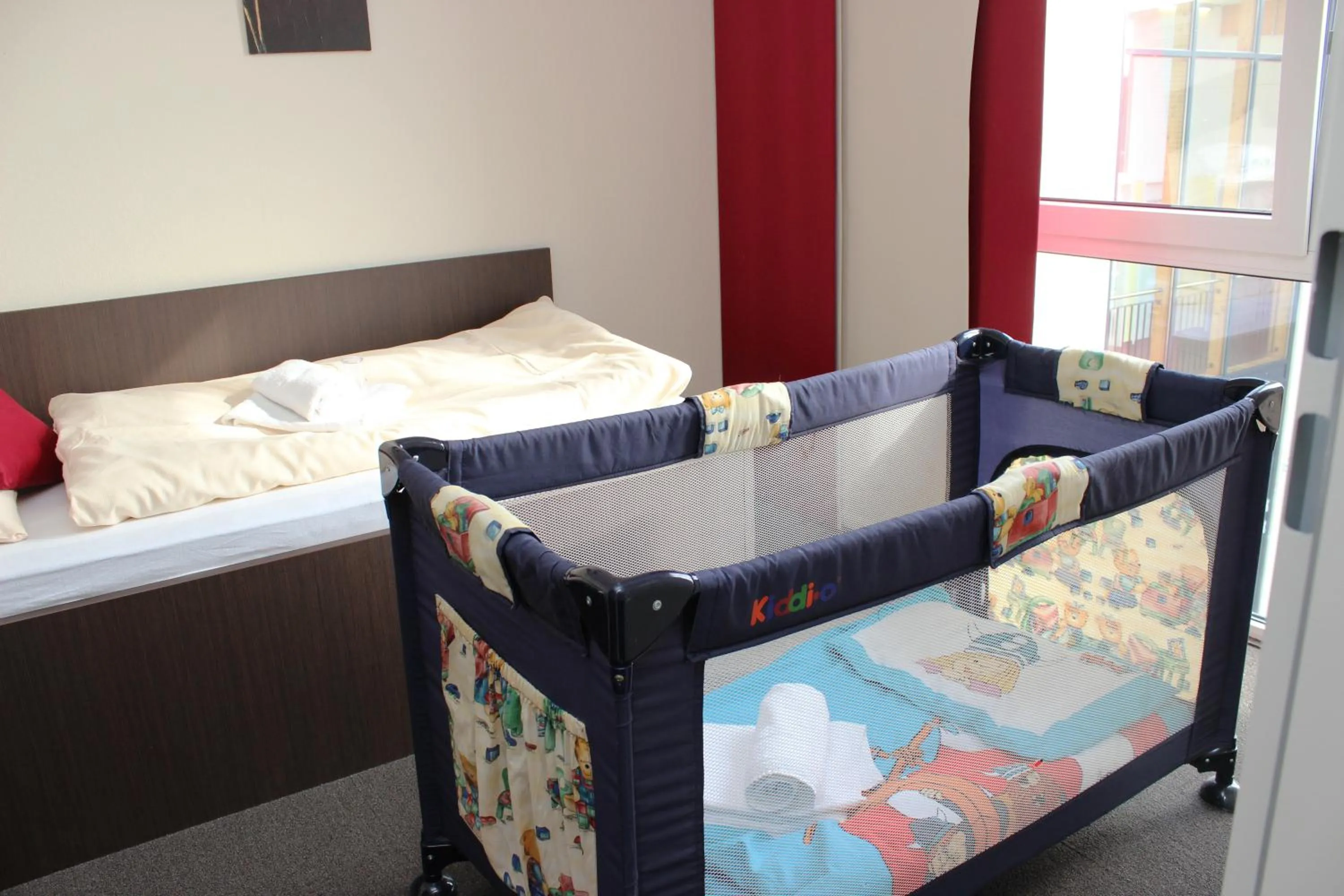 cot, Bed in Arena Hotel