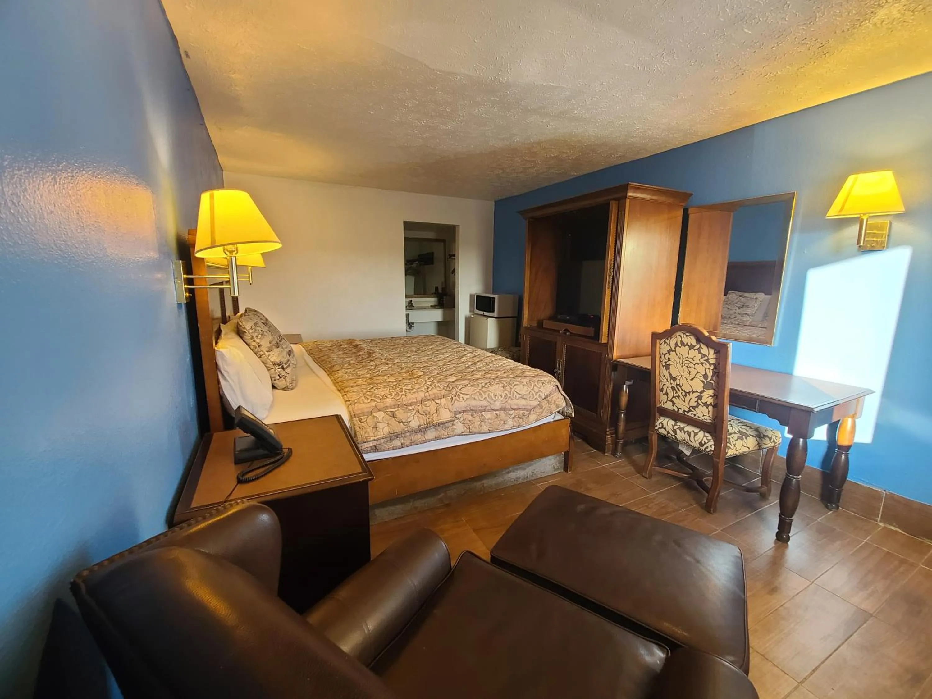 Bed in Garden Inn and Extended Stay