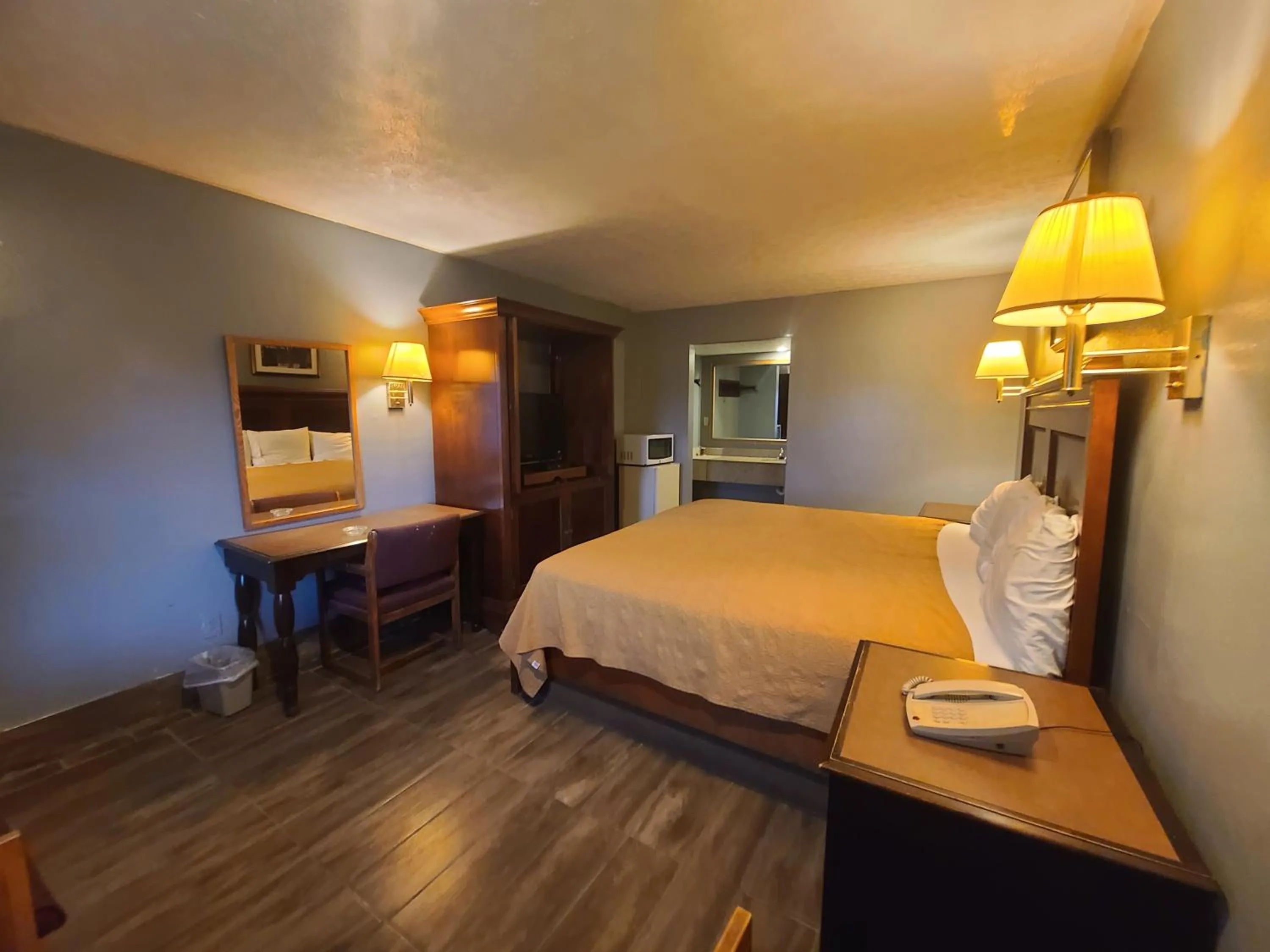 Bed in Garden Inn and Extended Stay