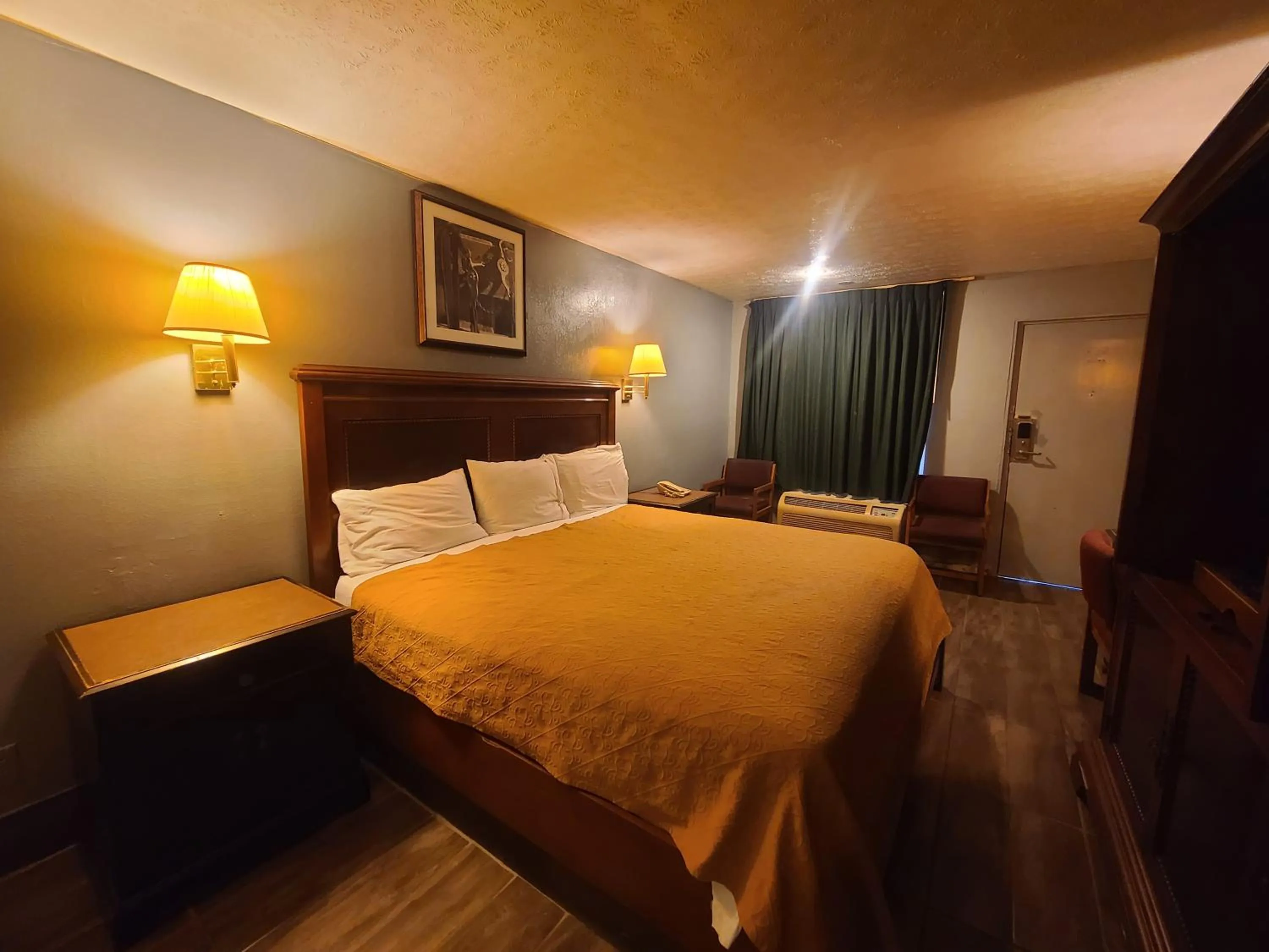 Bed in Garden Inn and Extended Stay