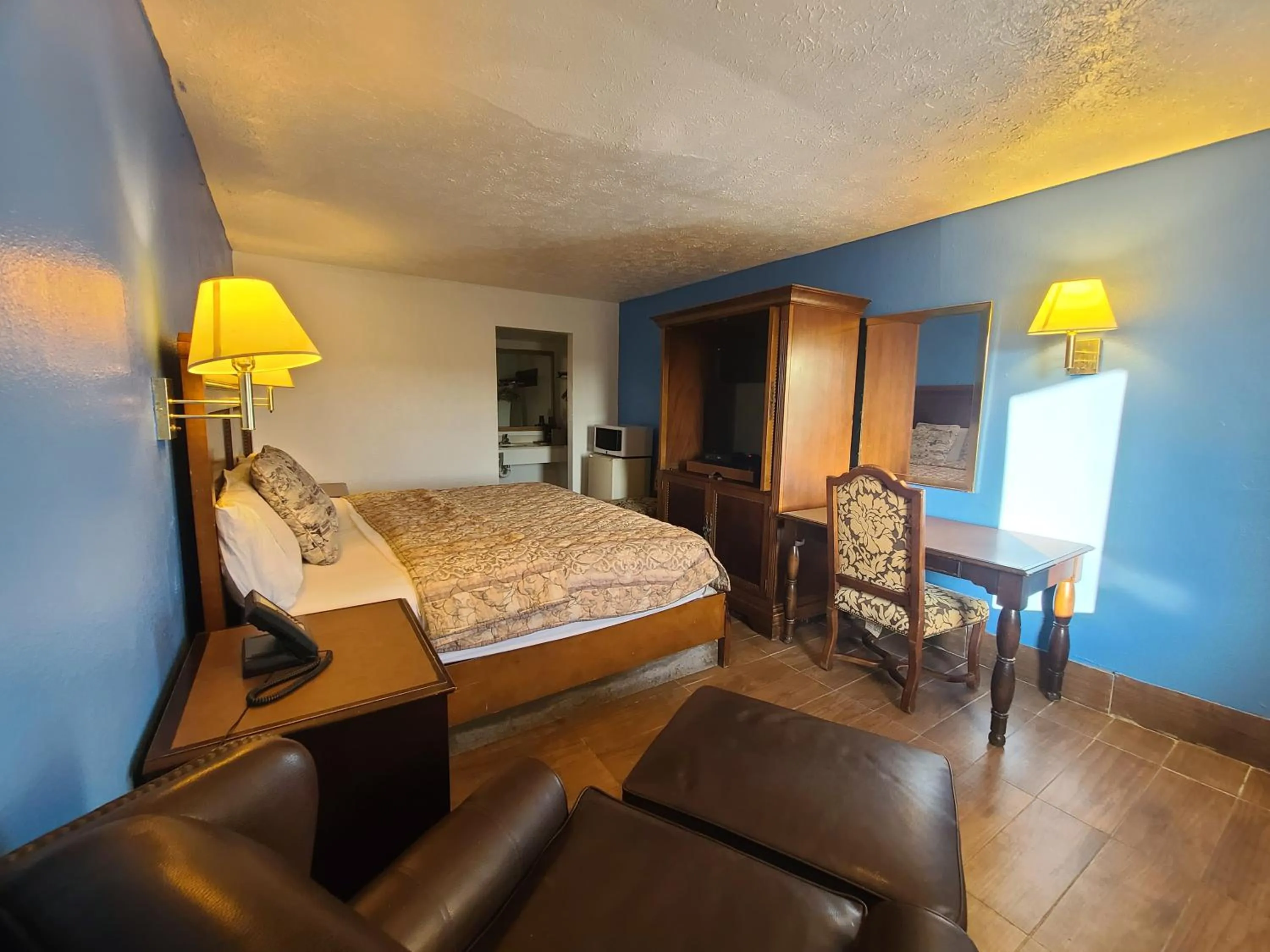 Bed in Garden Inn and Extended Stay