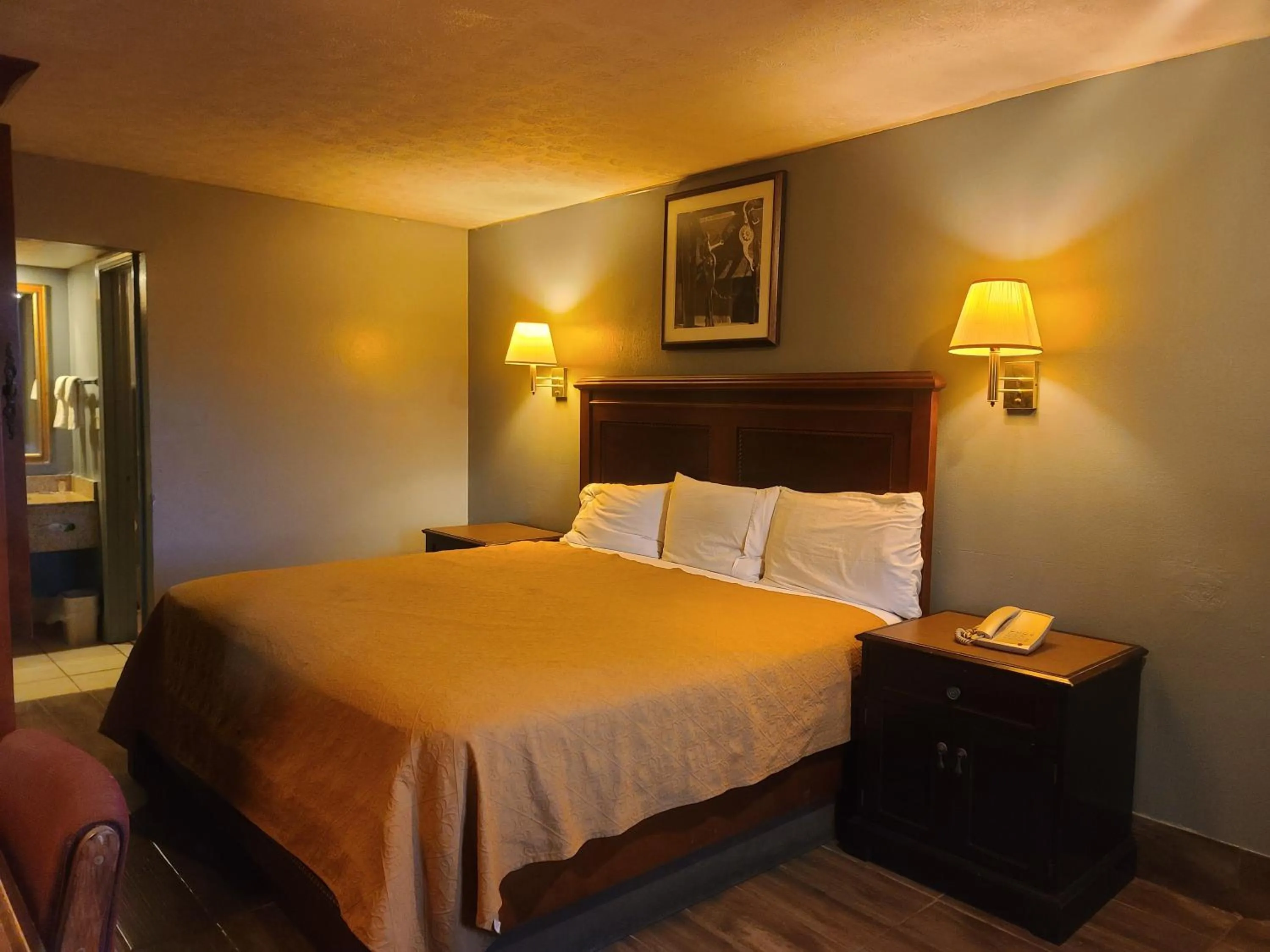 Bed in Garden Inn and Extended Stay