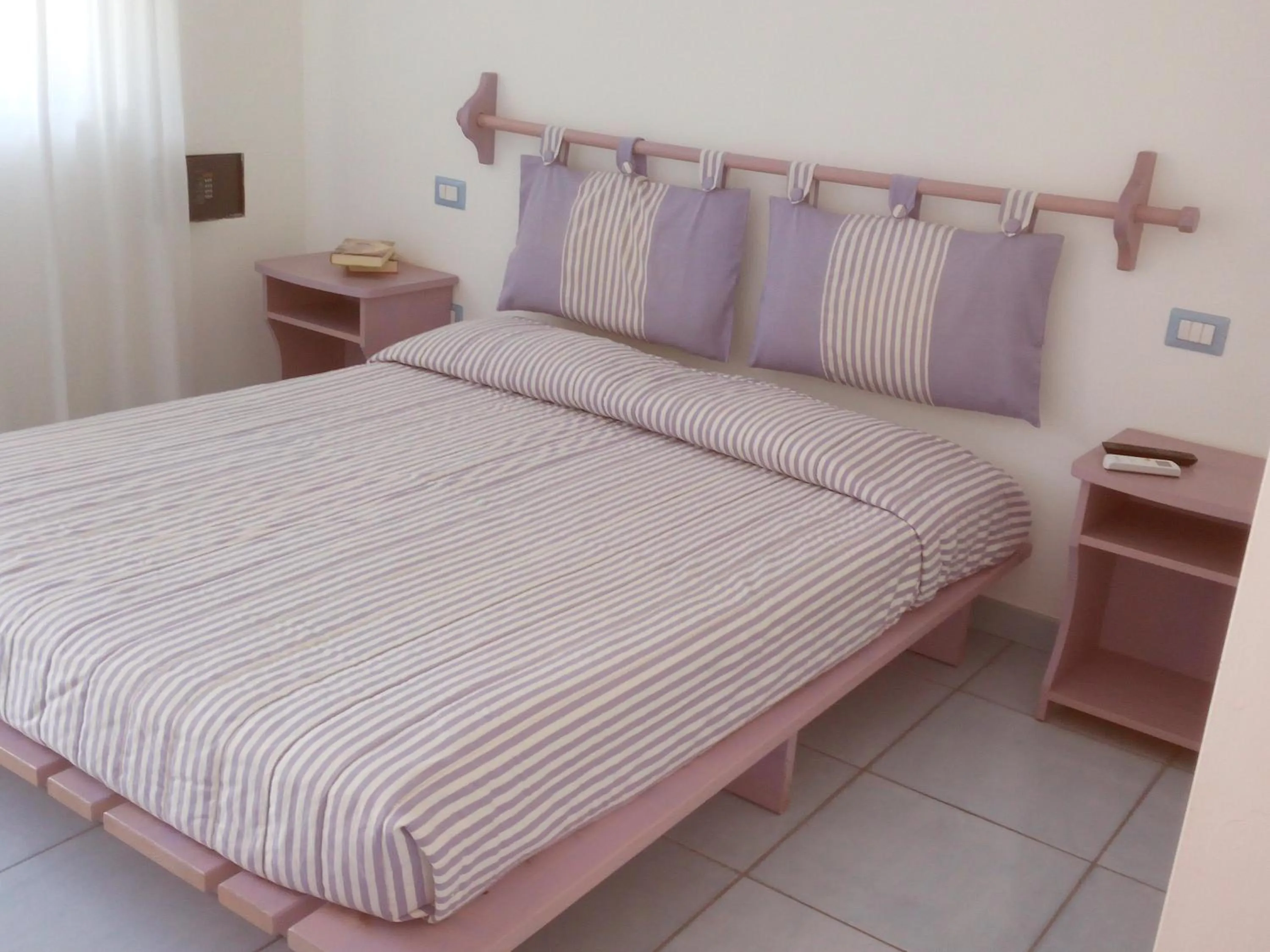 Bed in B&B Conca del Faro