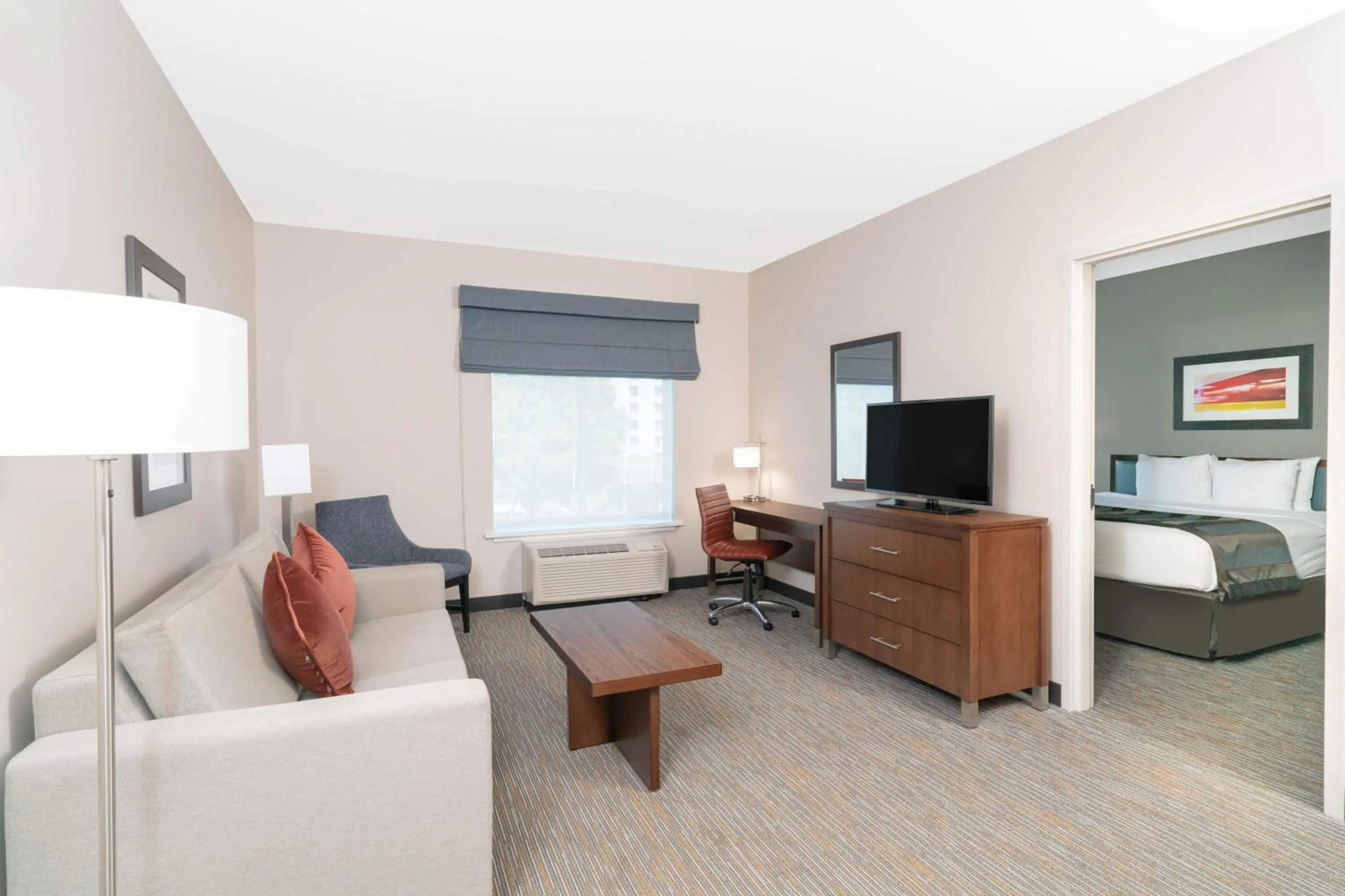 Living room, Bed in Hampton Inn by Hilton Nashville Airport Century Place