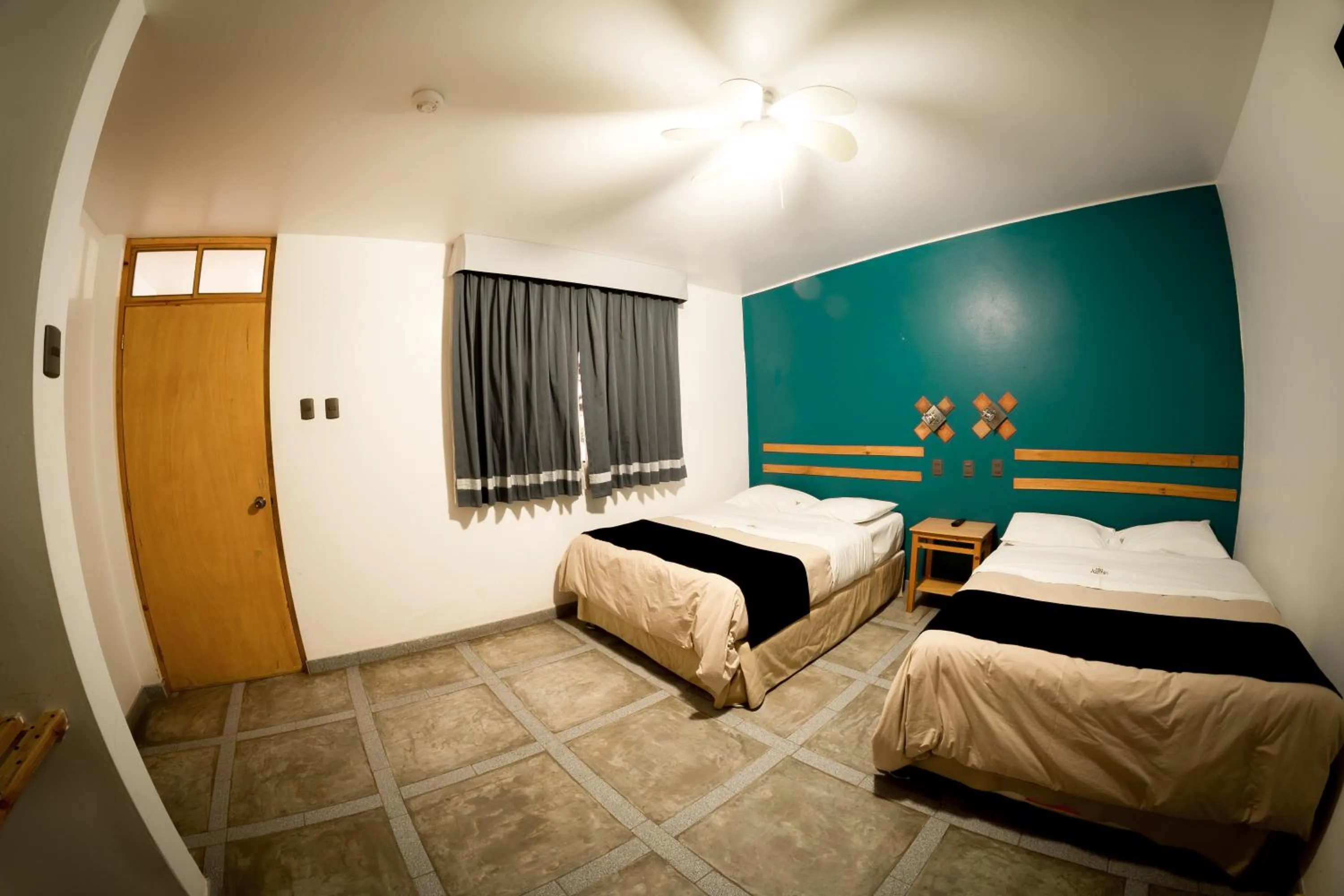 Bed in Hotel Villa Jazmin