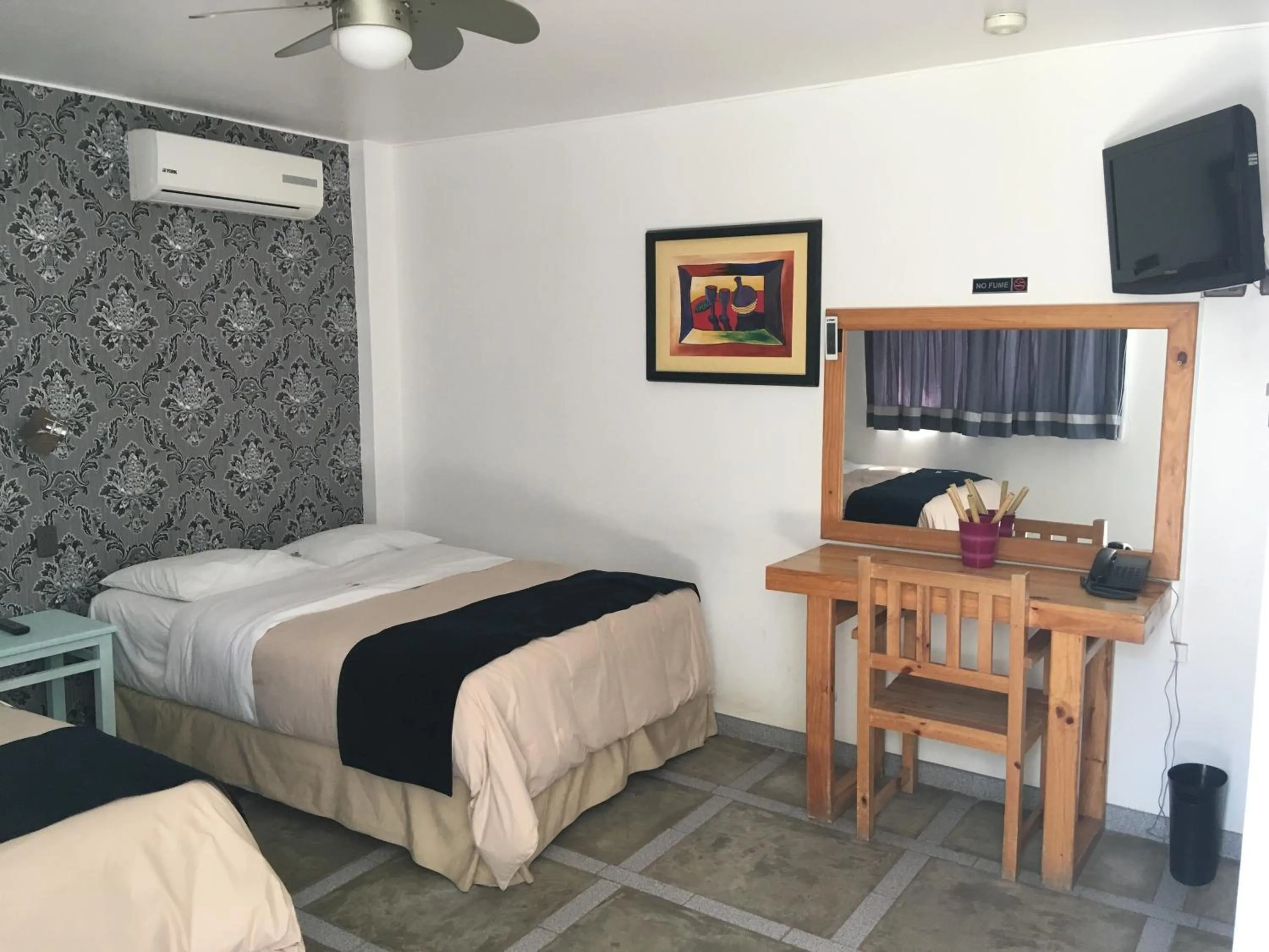 Bed in Hotel Villa Jazmin