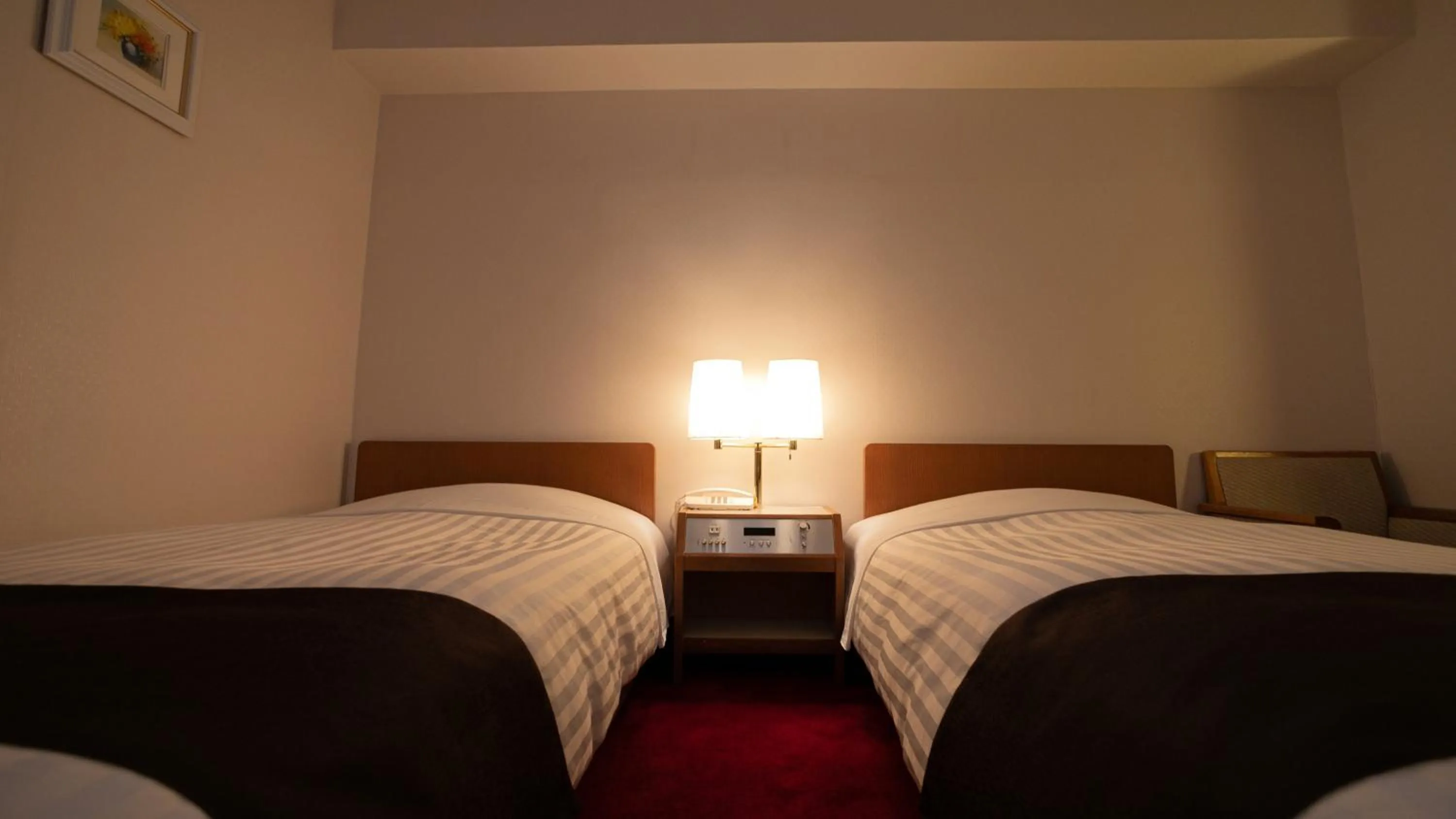 Bed in Hotel New Star Ikebukuro