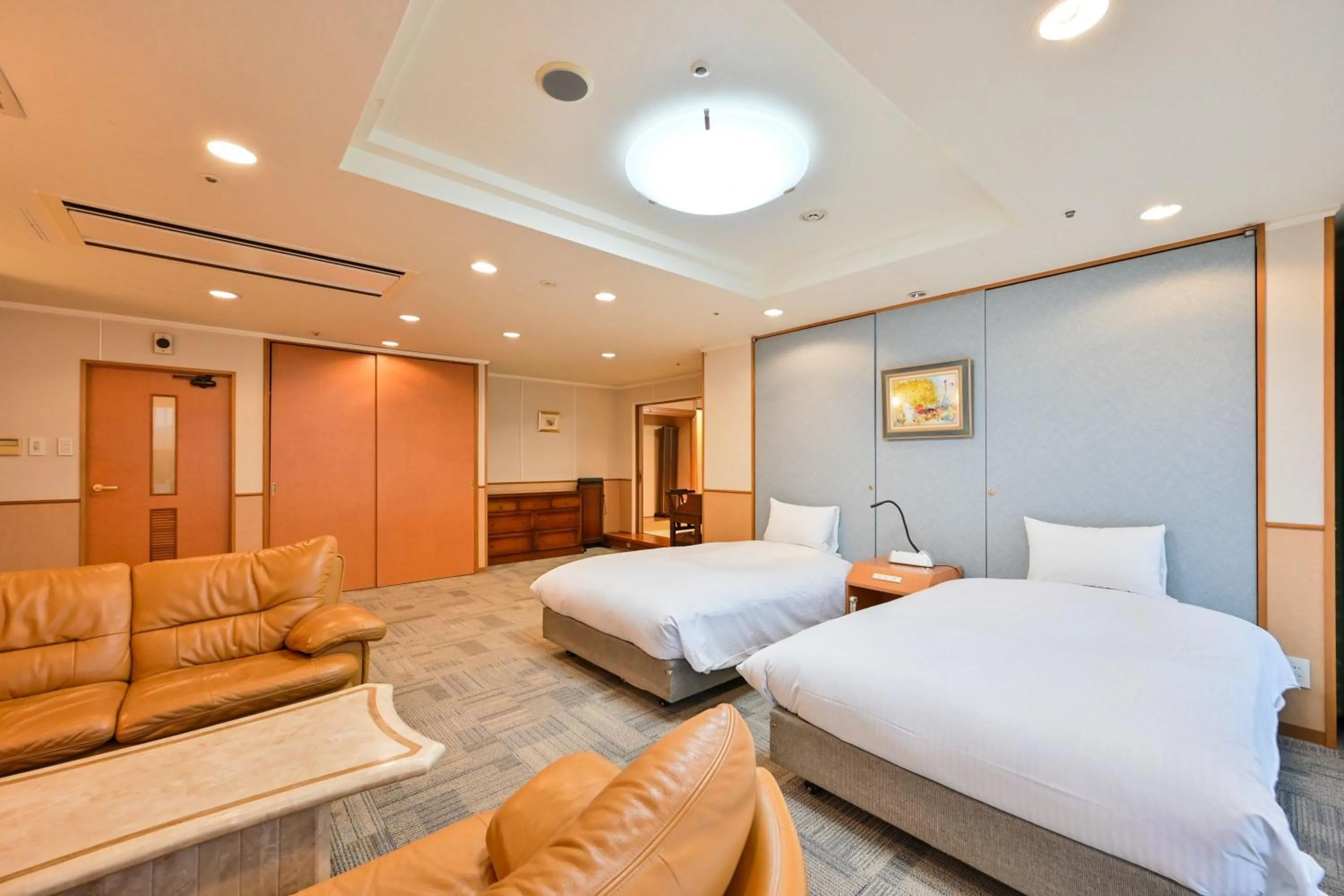 Bed in Central Hotel Sasebo