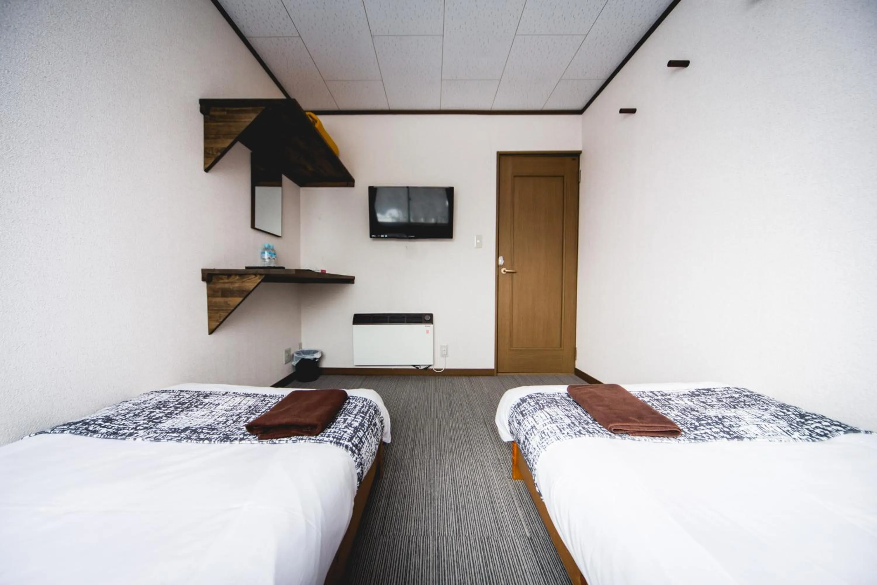 Bed in Hakuba Cortina Lodge