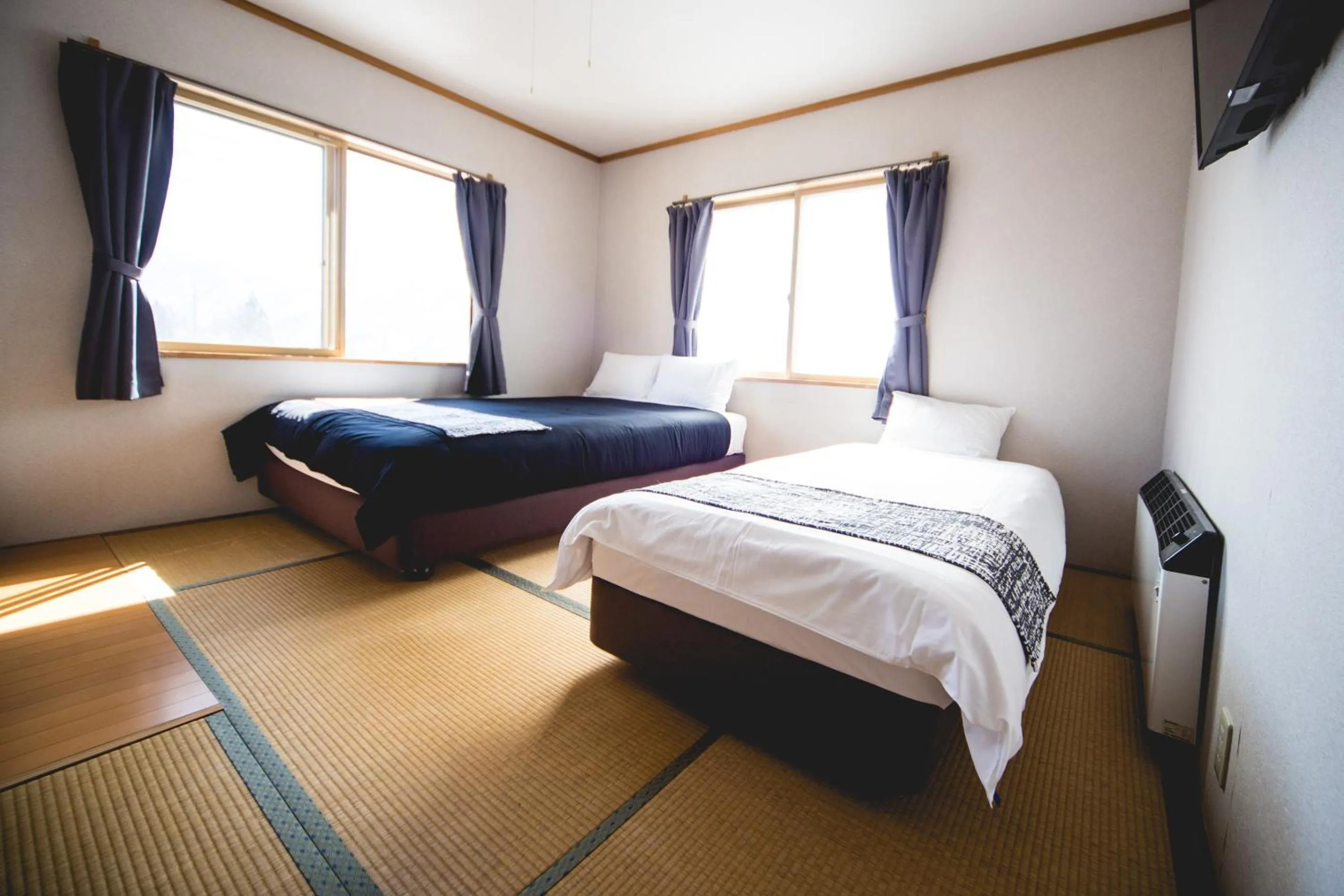 Bed in Hakuba Cortina Lodge