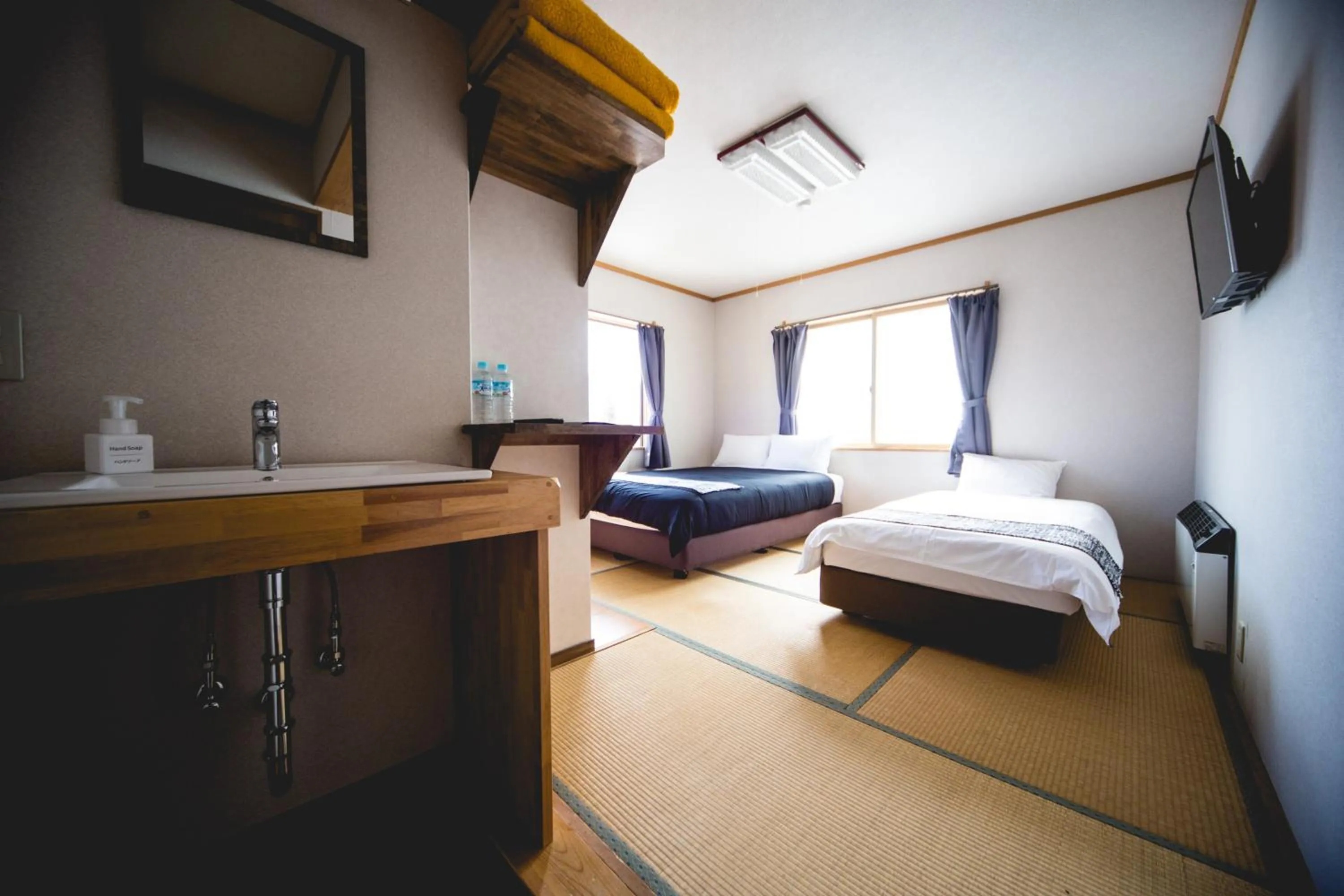 Bed in Hakuba Cortina Lodge