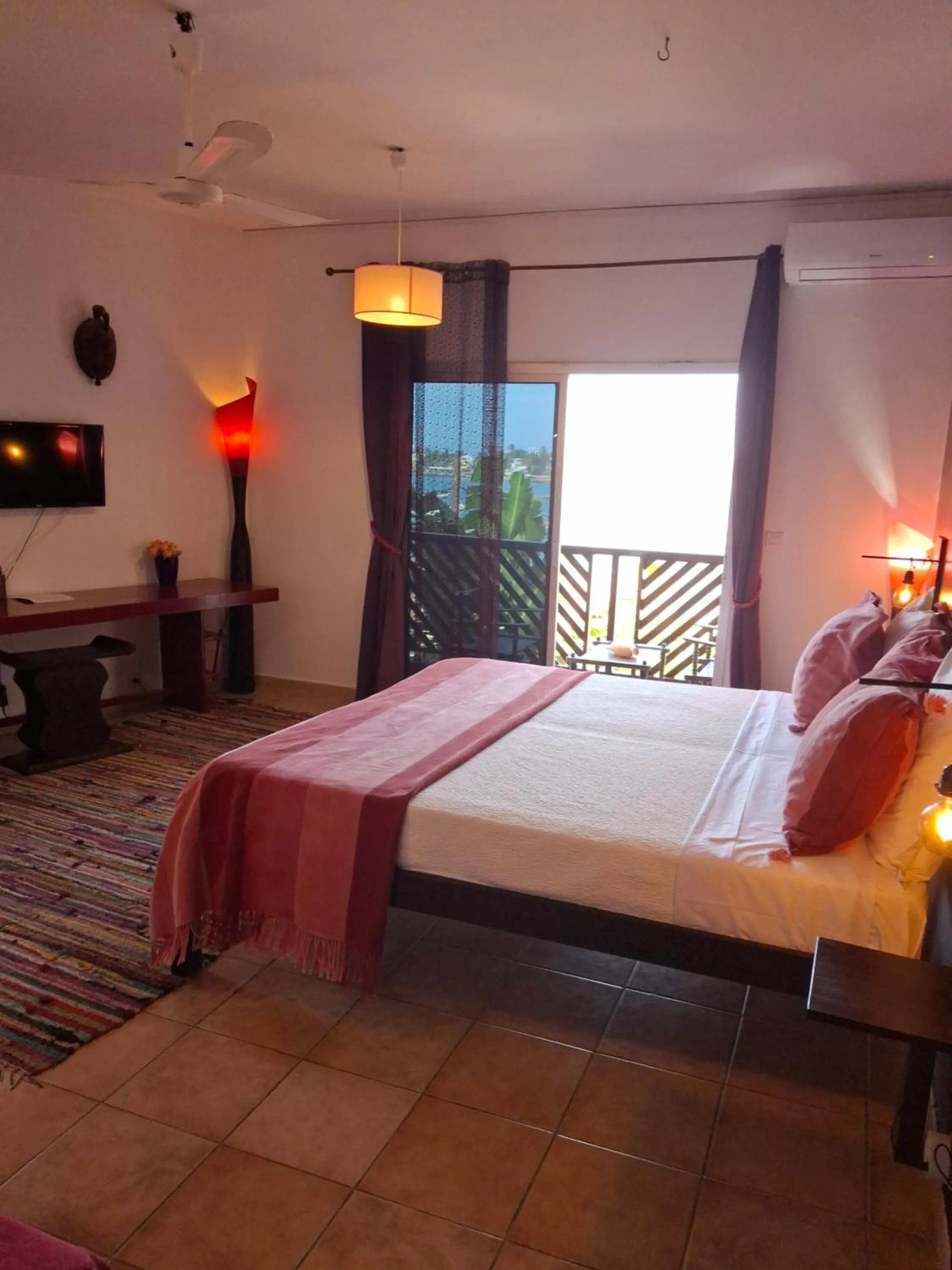 Bed in La Maison Abaka